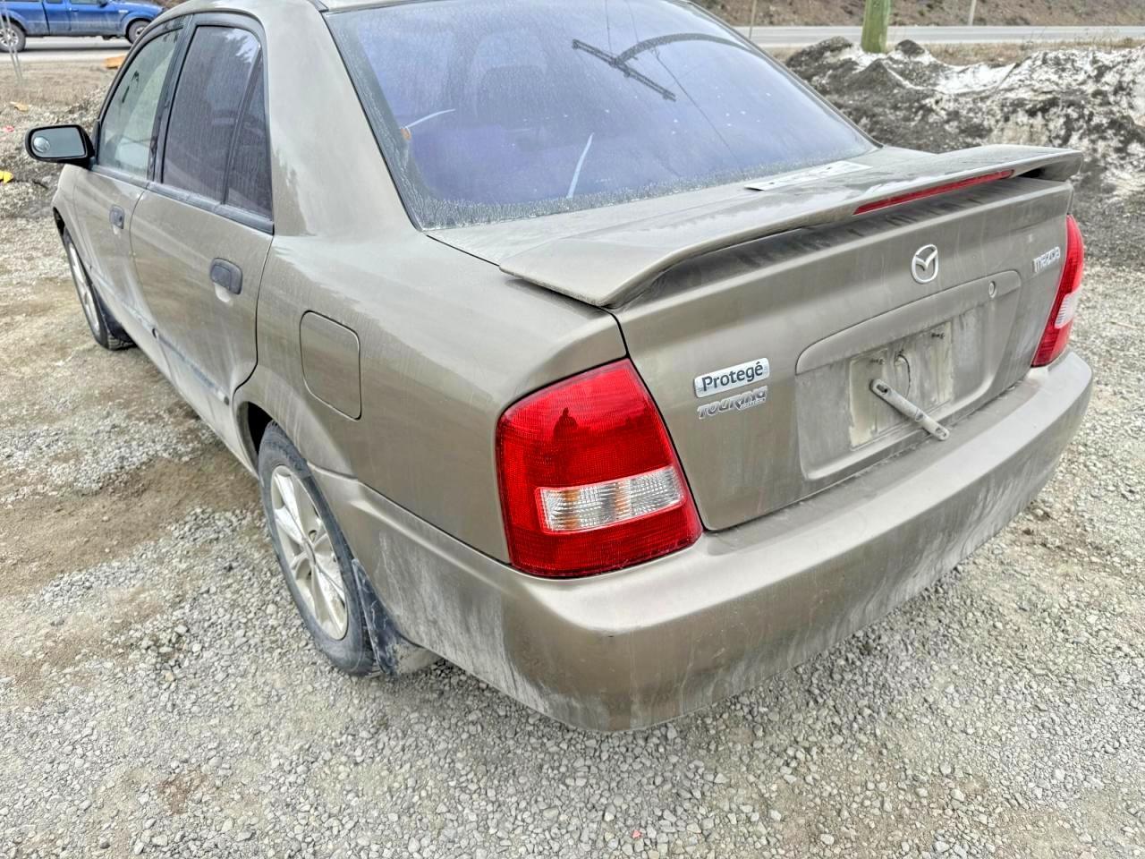 1999 Mazda Protege Es Brown vin: JM1BJ2217X0169403
