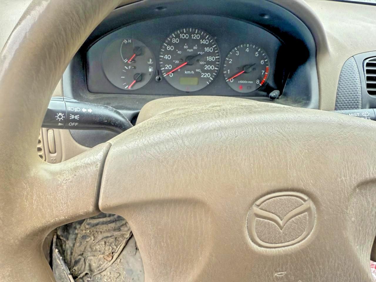 1999 Mazda Protege Es Brown vin: JM1BJ2217X0169403