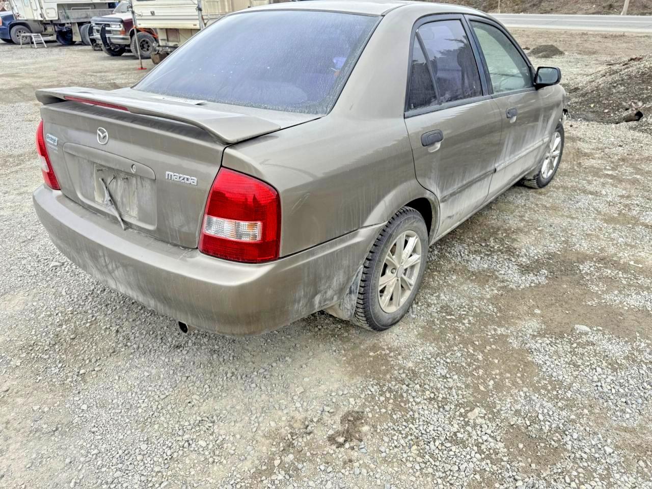 1999 Mazda Protege Es Brown vin: JM1BJ2217X0169403