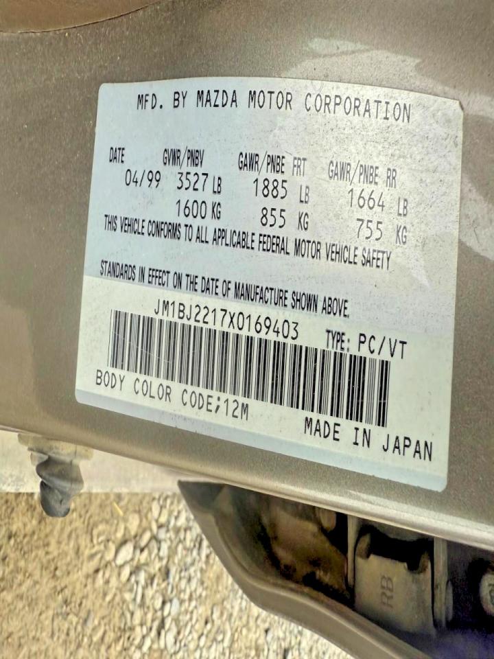 1999 Mazda Protege Es Brown vin: JM1BJ2217X0169403