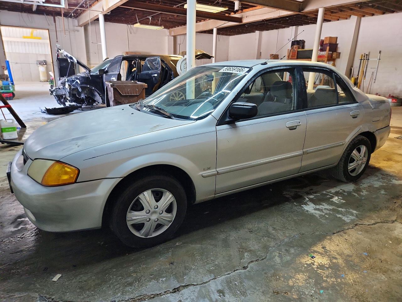 1999 Mazda Protege Lx Silver vin: JM1BJ2220X0134923