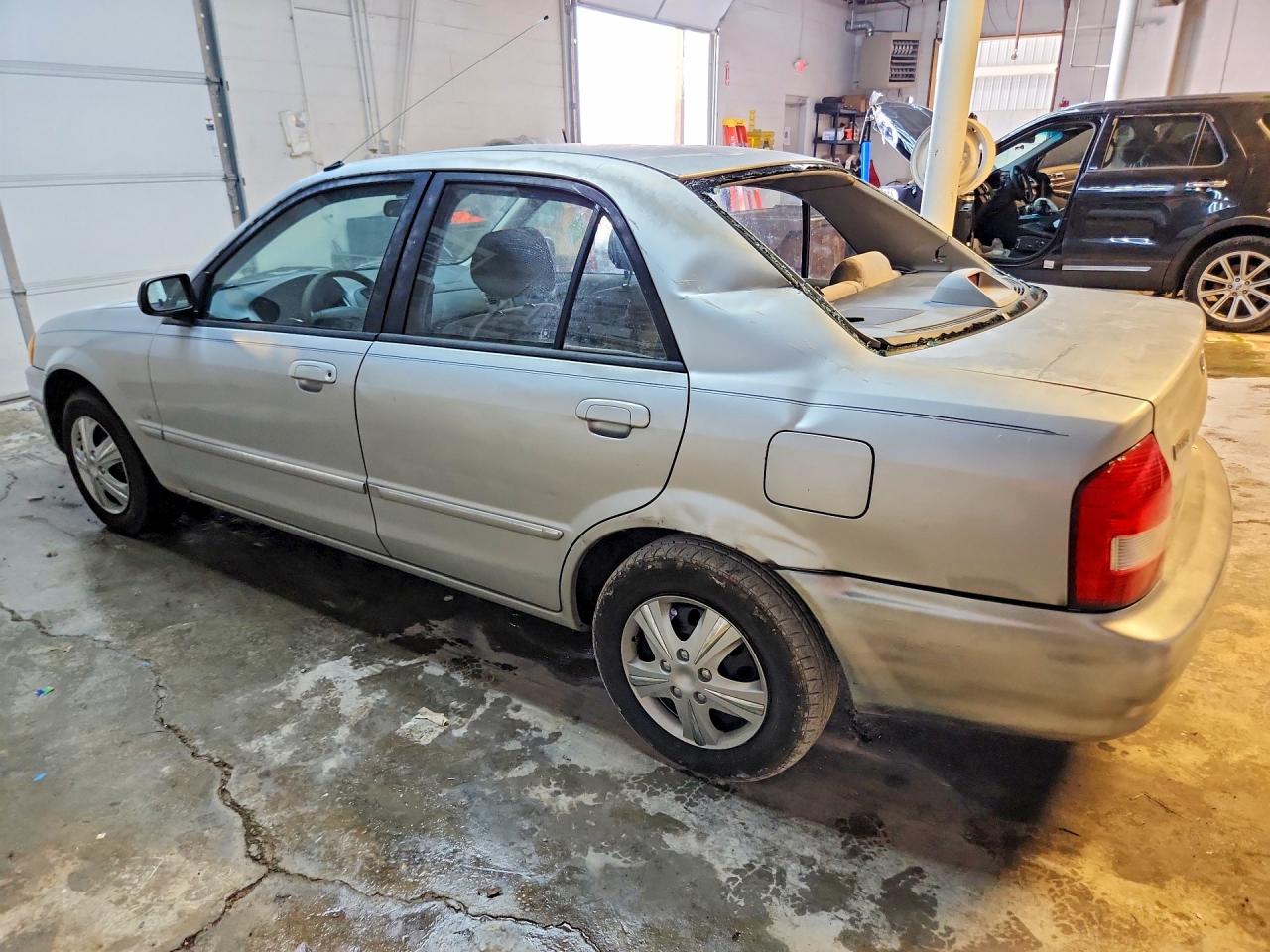1999 Mazda Protege Lx Silver vin: JM1BJ2220X0134923