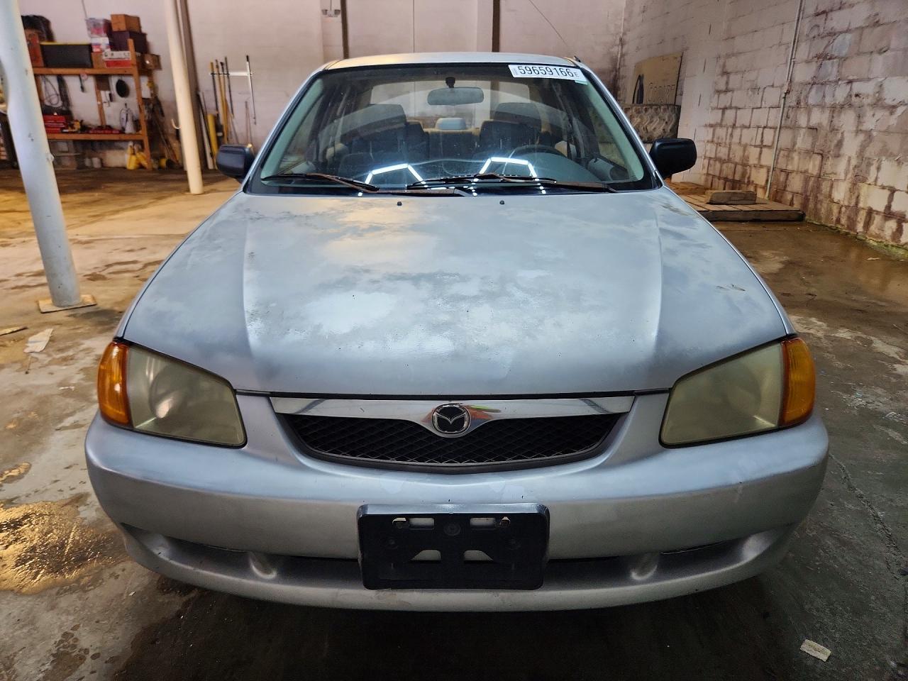 1999 Mazda Protege Lx Silver vin: JM1BJ2220X0134923