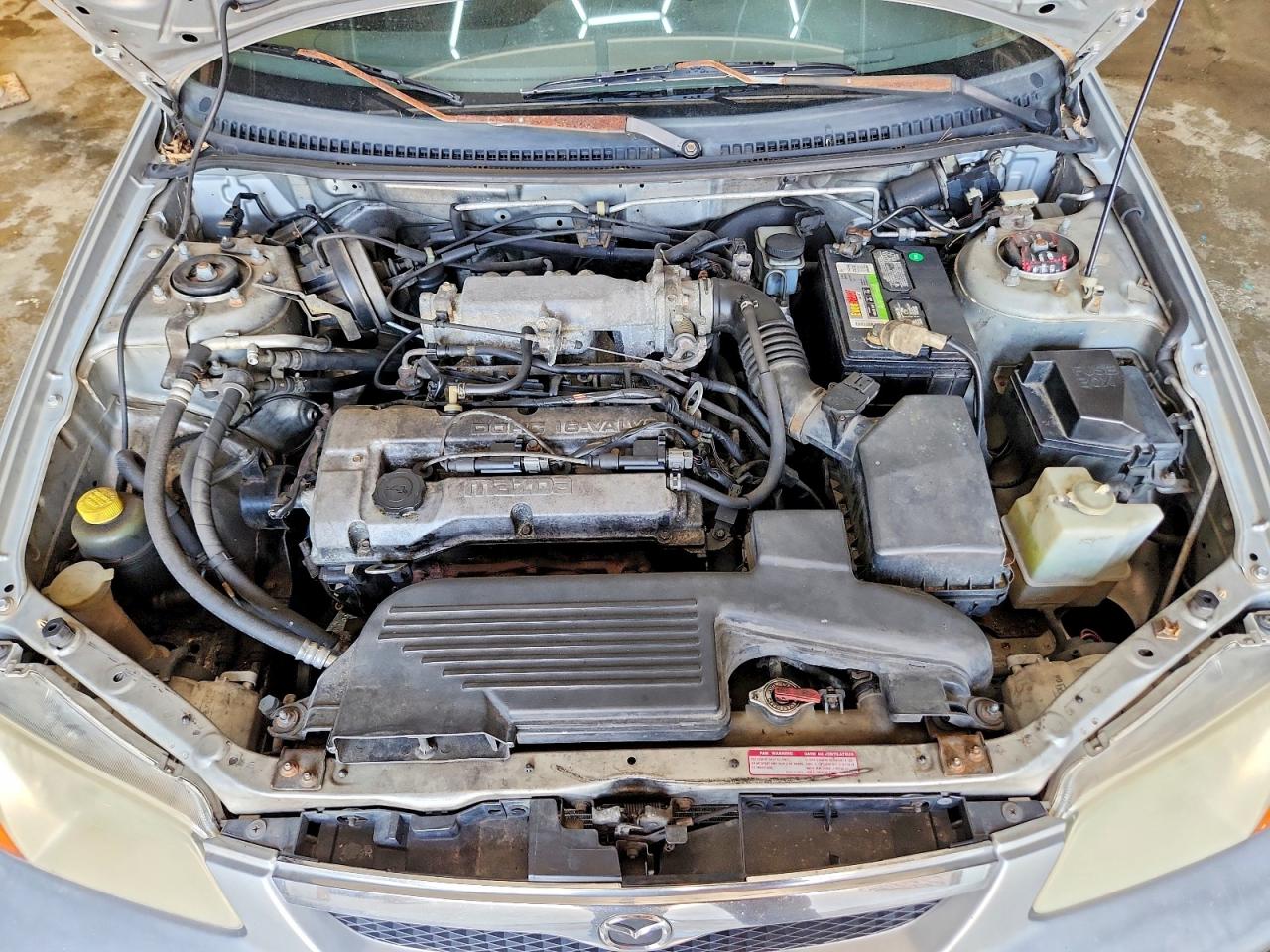 1999 Mazda Protege Lx Silver vin: JM1BJ2220X0134923