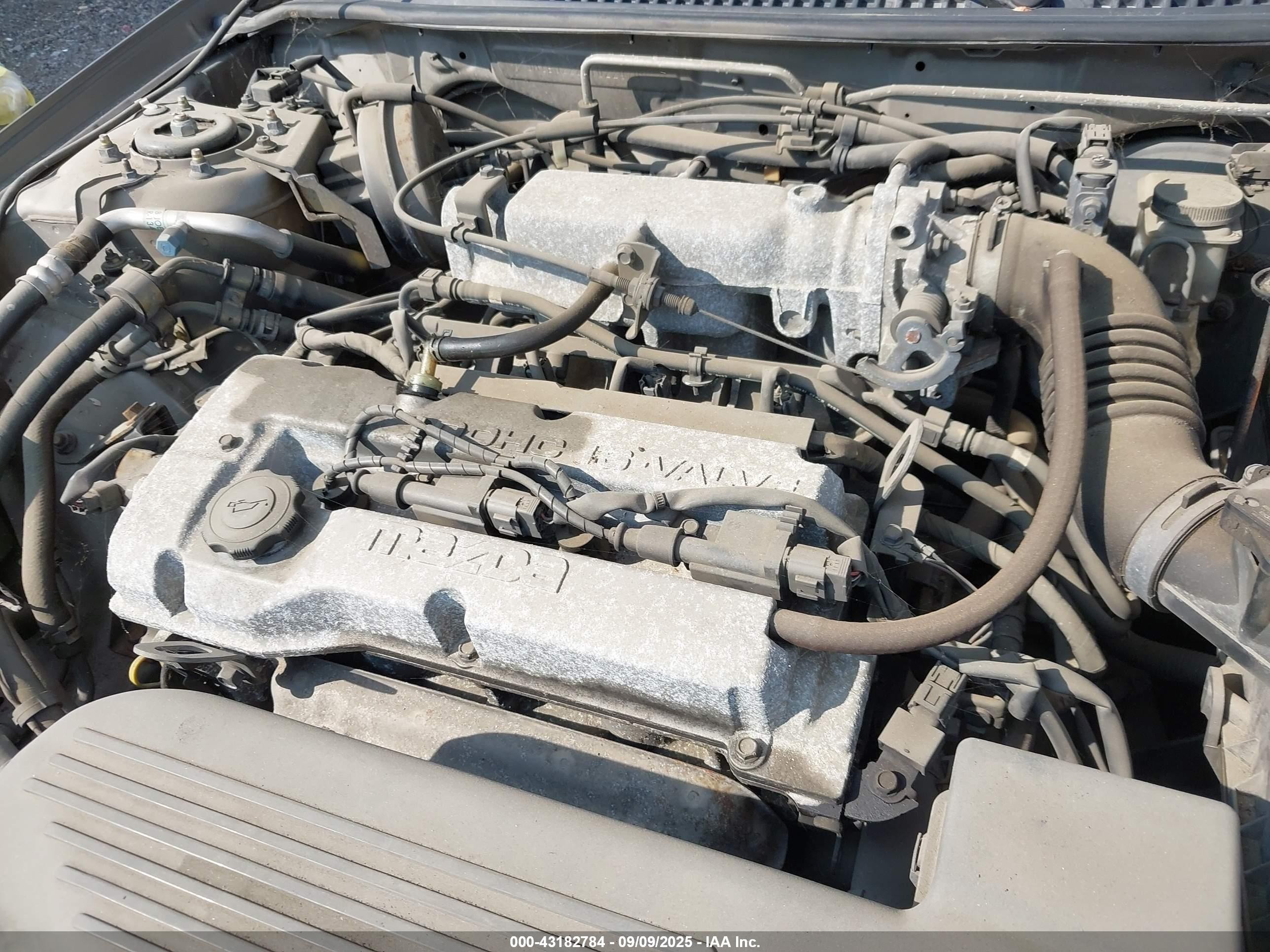 2000 Mazda Protege Dx/lx Champagne vin: JM1BJ2220Y0229709