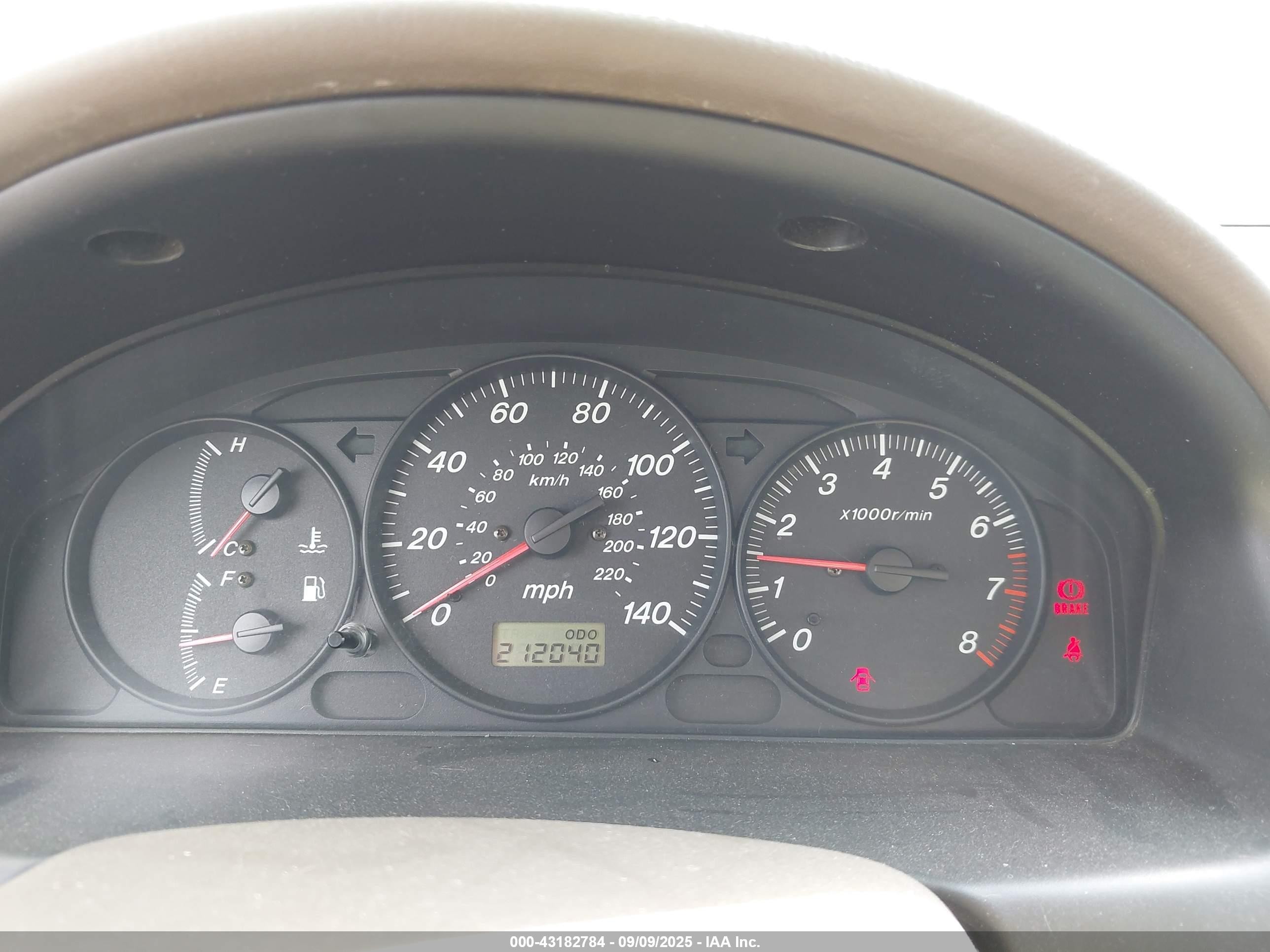 2000 Mazda Protege Dx/lx Champagne vin: JM1BJ2220Y0229709