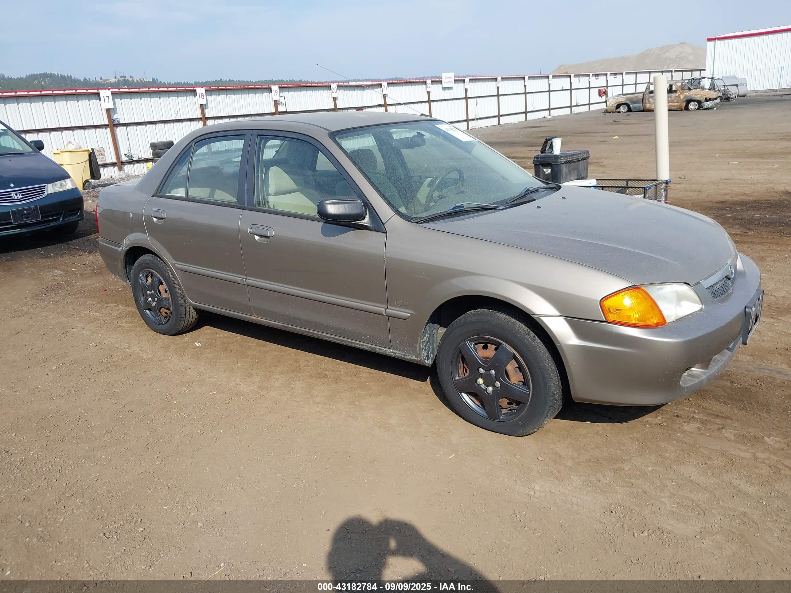 2000 Mazda Protege Dx/lx Champagne vin: JM1BJ2220Y0229709