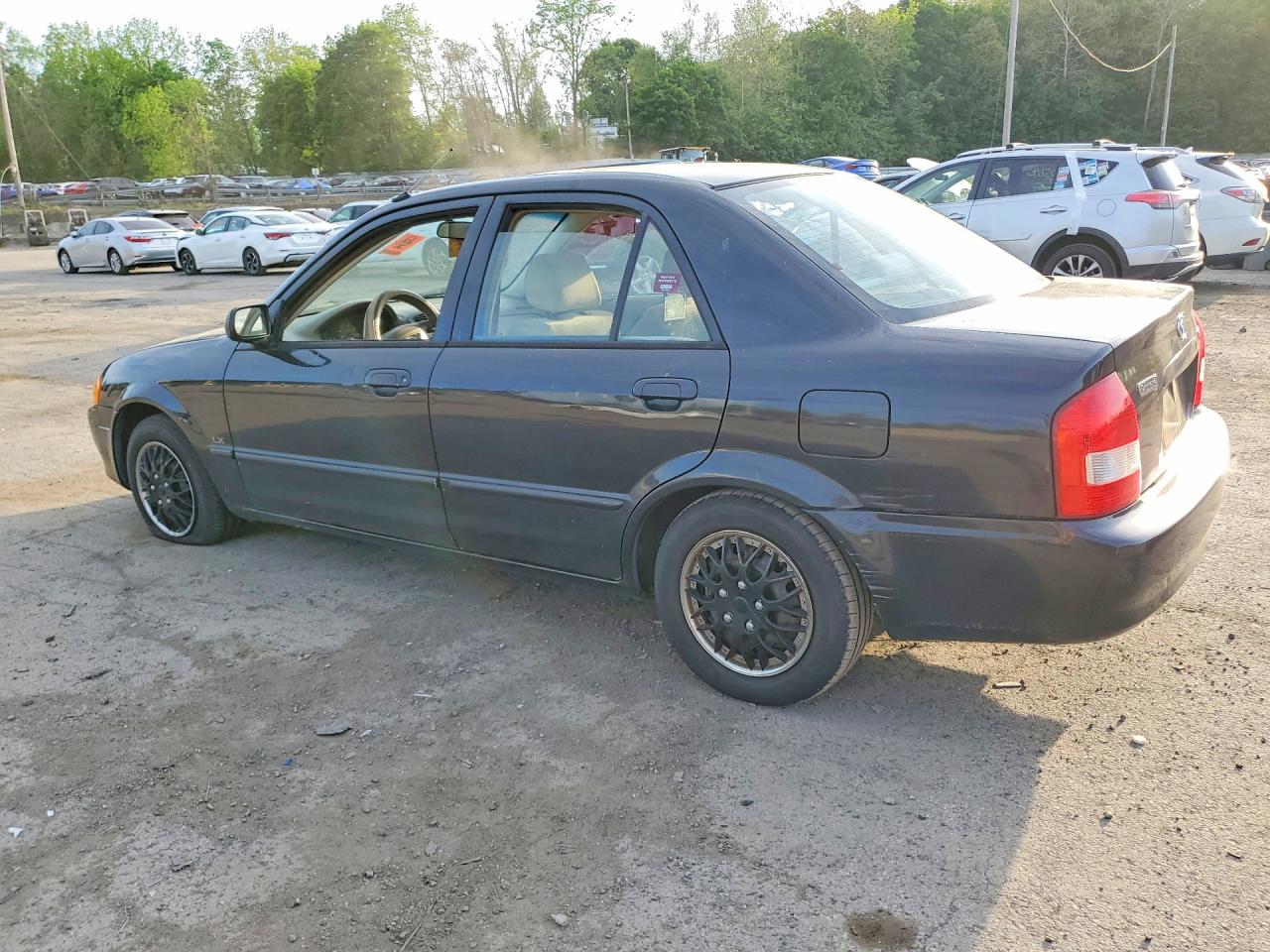 2000 Mazda Protege Dx Black vin: JM1BJ2224Y0255259