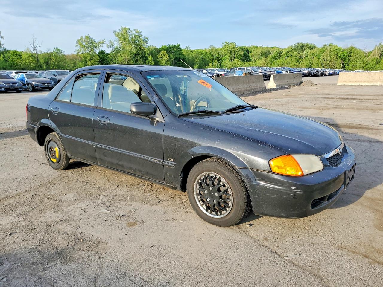 2000 Mazda Protege Dx Black vin: JM1BJ2224Y0255259