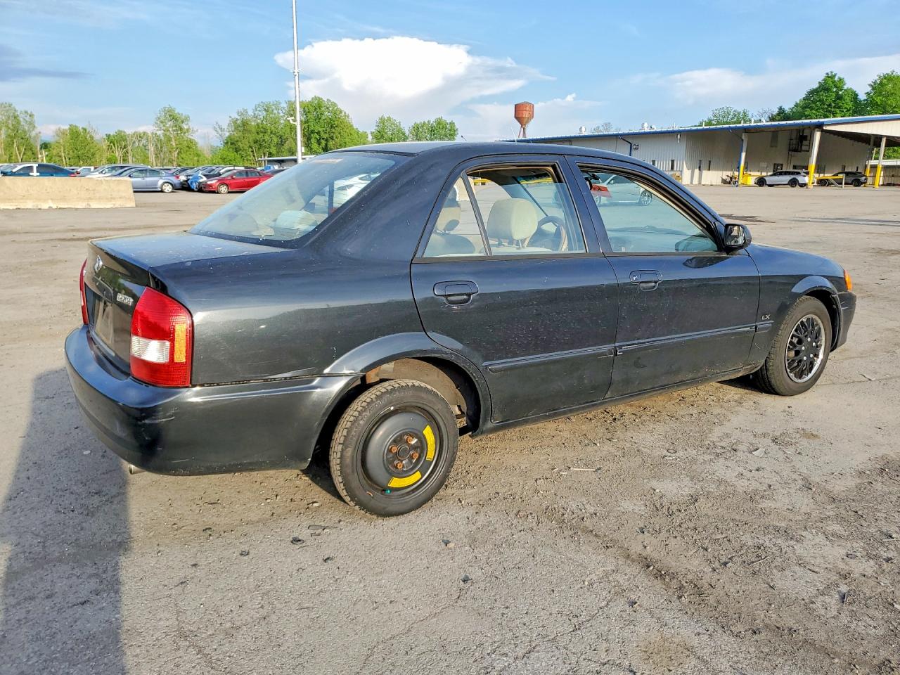 2000 Mazda Protege Dx Black vin: JM1BJ2224Y0255259