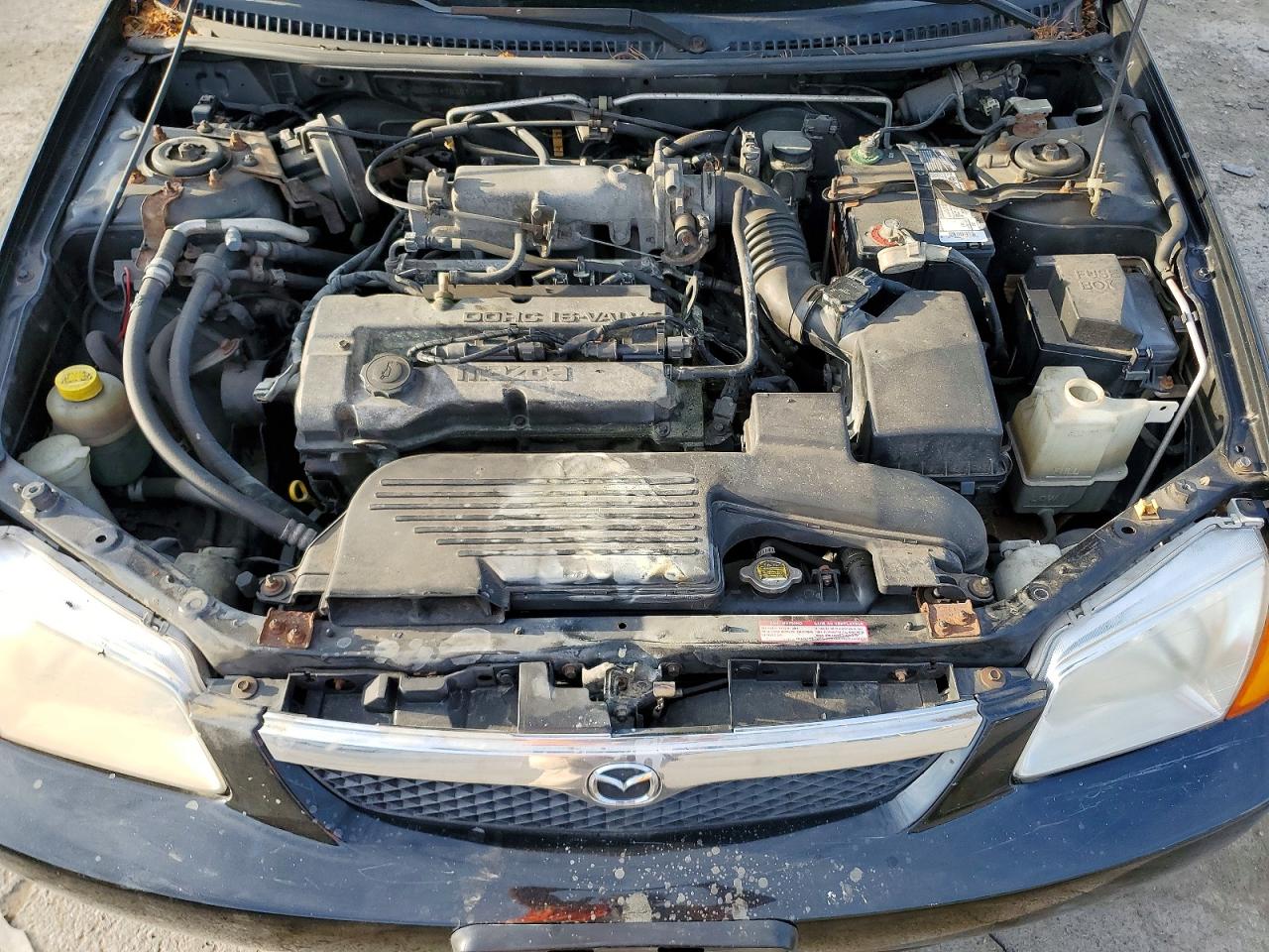 2000 Mazda Protege Dx Black vin: JM1BJ2224Y0255259