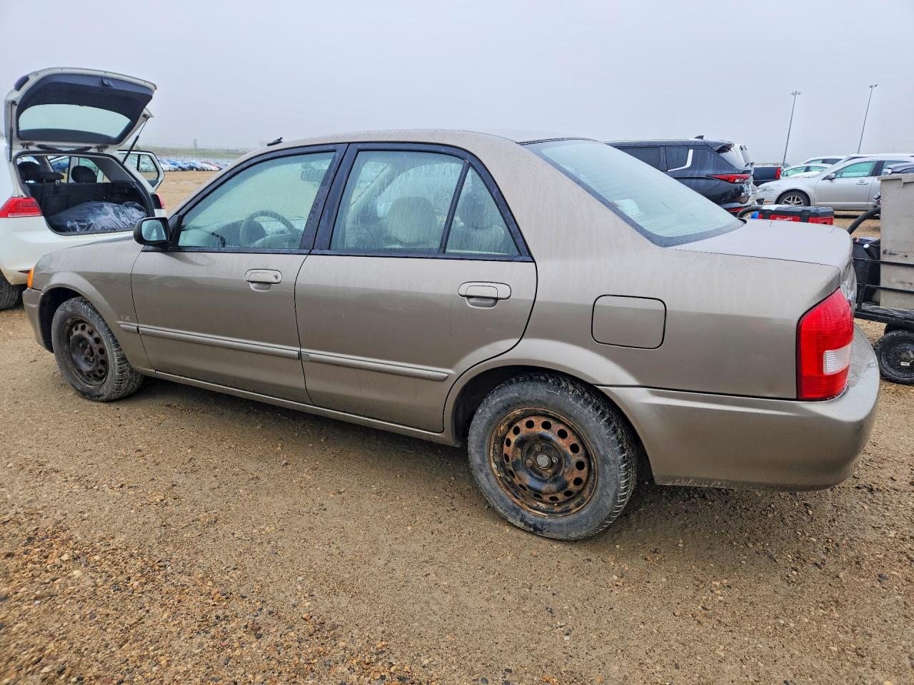 1999 Mazda Protege Dx Brown vin: JM1BJ2225X0117745