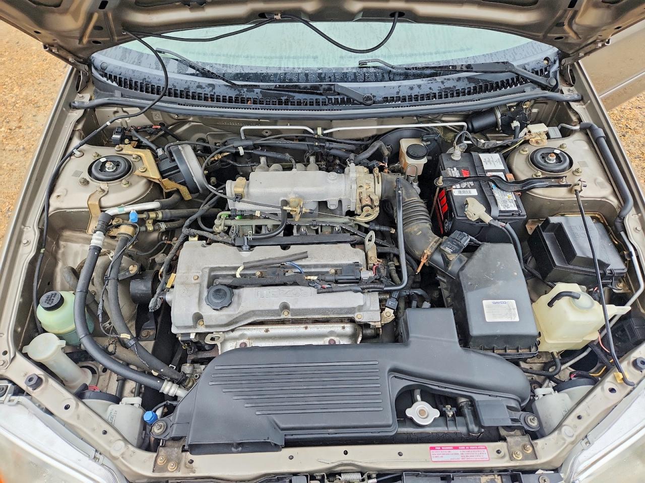 1999 Mazda Protege Dx Brown vin: JM1BJ2225X0117745