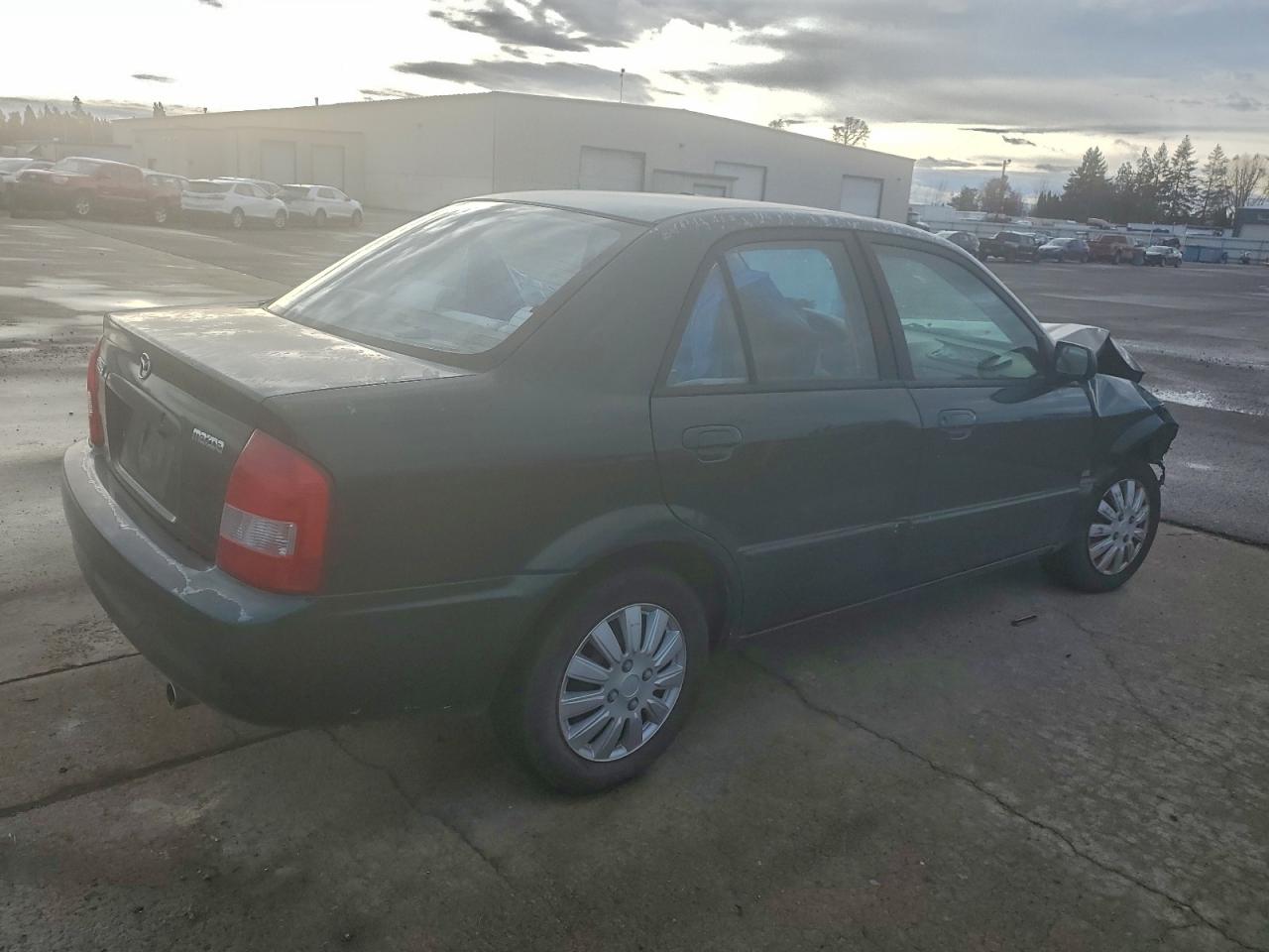 2000 Mazda Protege Dx Green vin: JM1BJ2225Y0218642