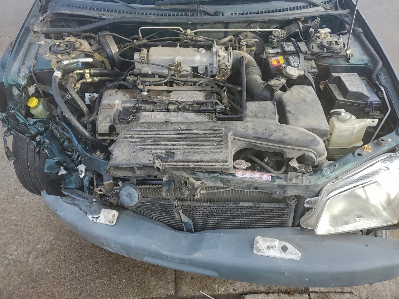 2000 Mazda Protege Dx Green vin: JM1BJ2225Y0218642