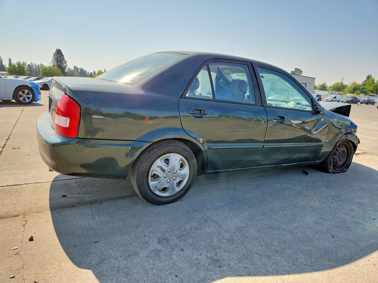 1999 Mazda Protege Dx Зеленый vin: JM1BJ2228X0132384