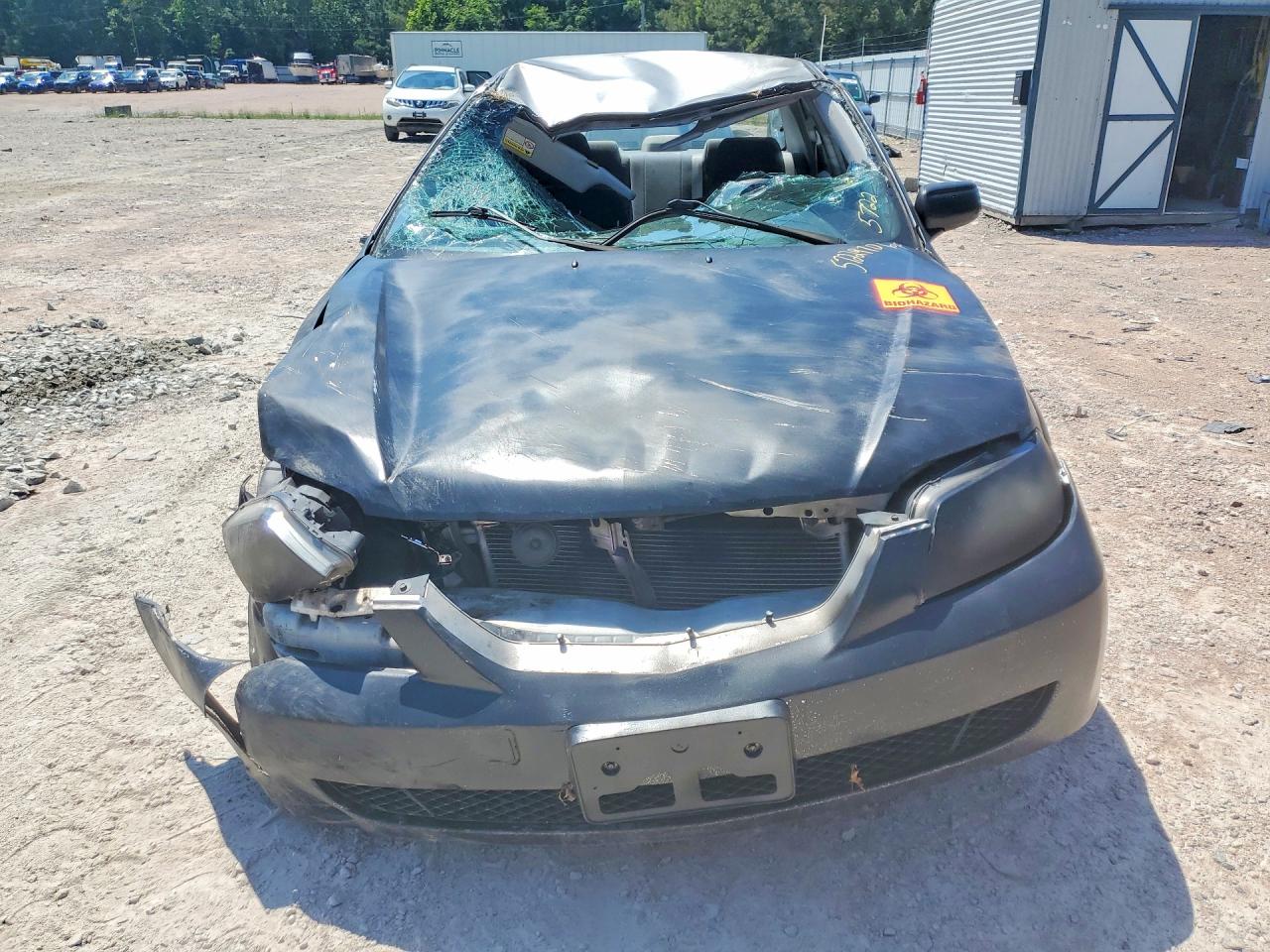 2003 Mazda Protege Черный vin: JM1BJ225030115941