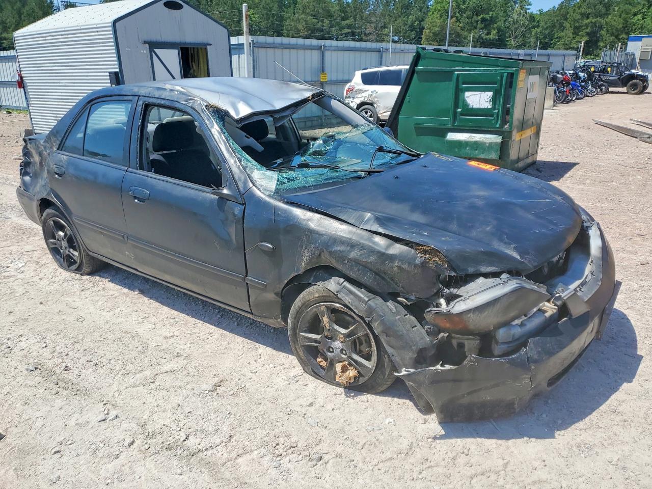 2003 Mazda Protege Черный vin: JM1BJ225030115941