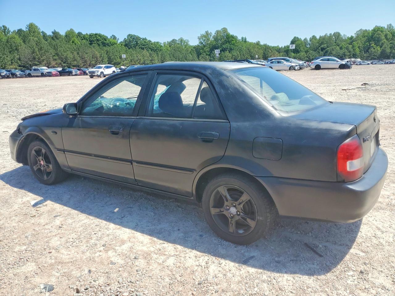 2003 Mazda Protege Черный vin: JM1BJ225030115941