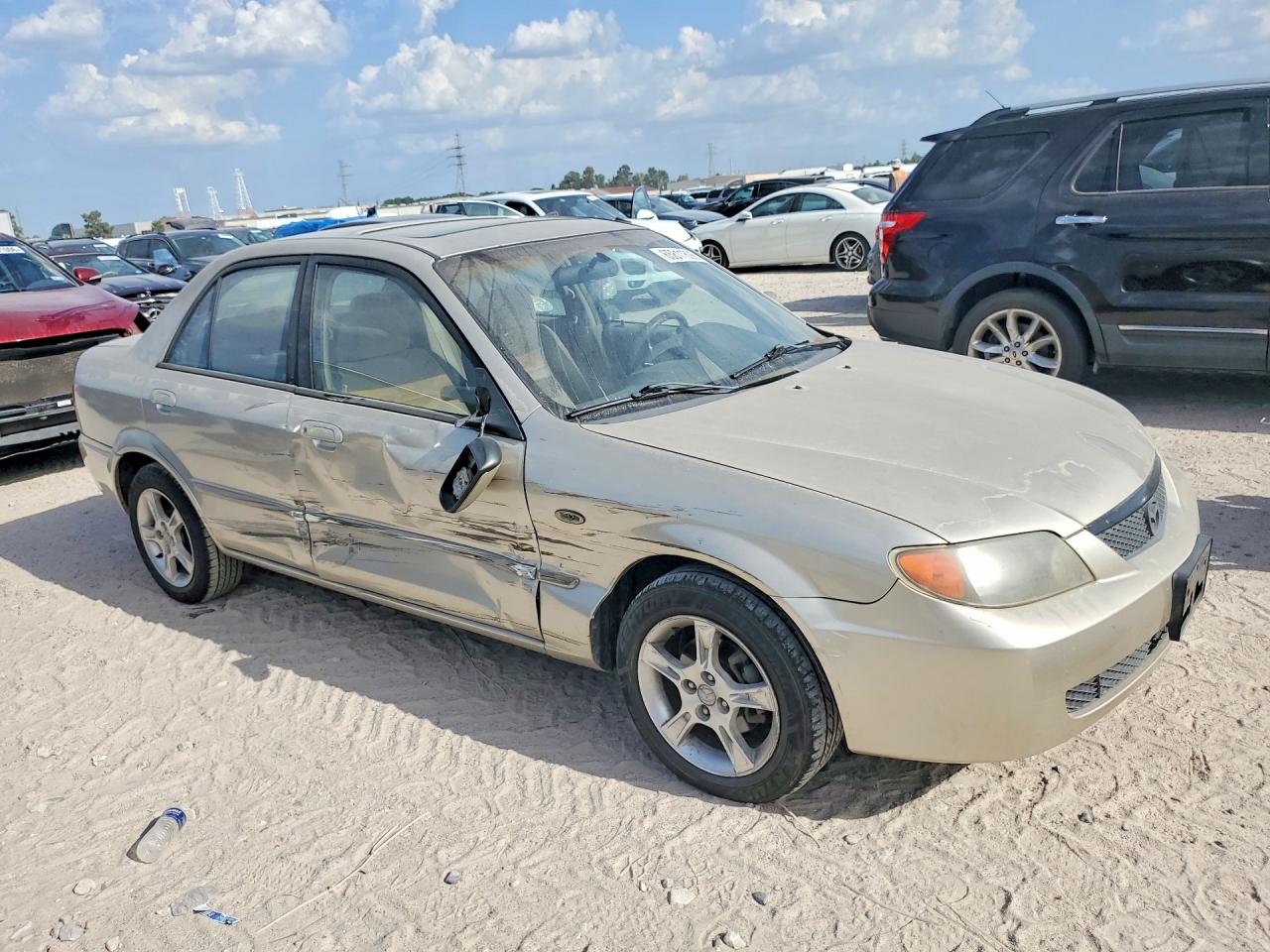 2003 Mazda Protege Dx Gold vin: JM1BJ225130191300