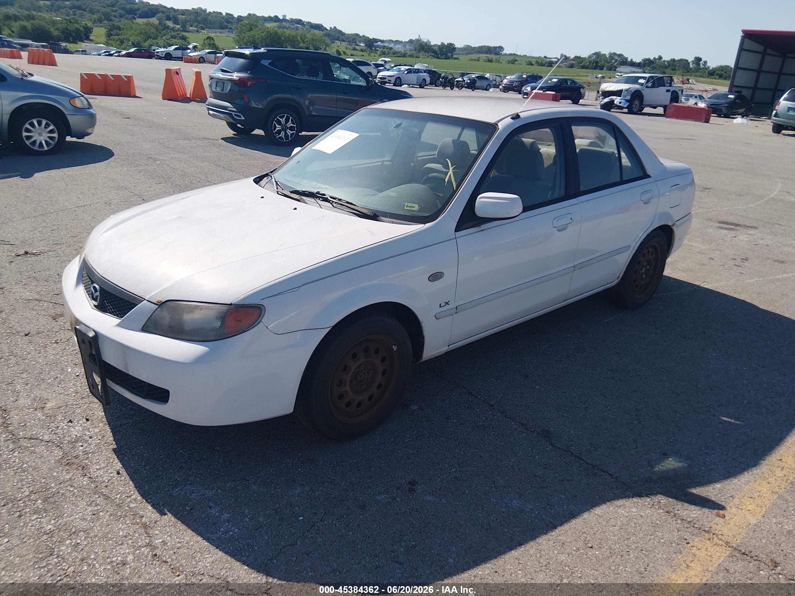 2002 Mazda Protege Dx/es/lx Желто-коричневый vin: JM1BJ225221606813