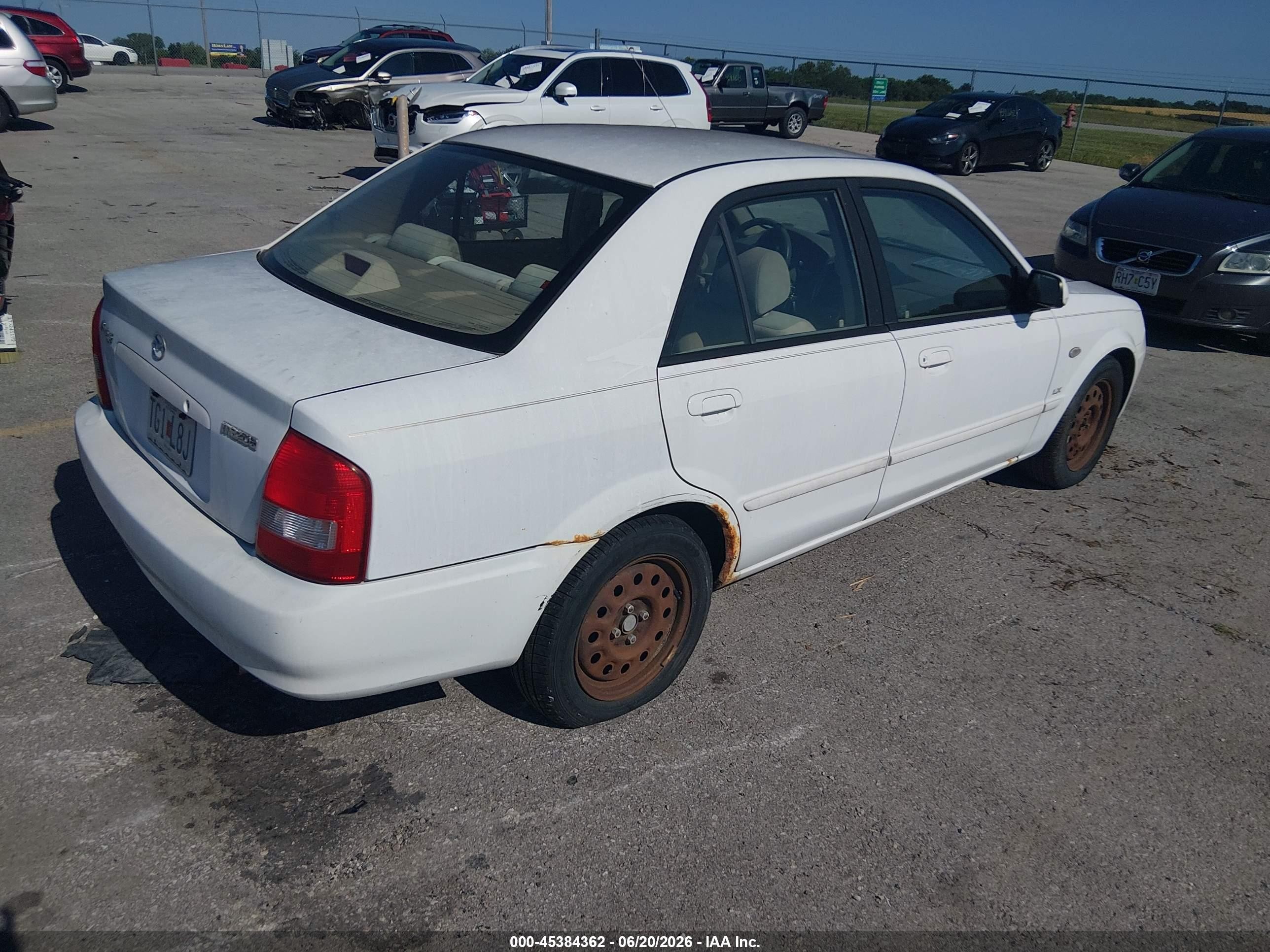 2002 Mazda Protege Dx/es/lx Желто-коричневый vin: JM1BJ225221606813