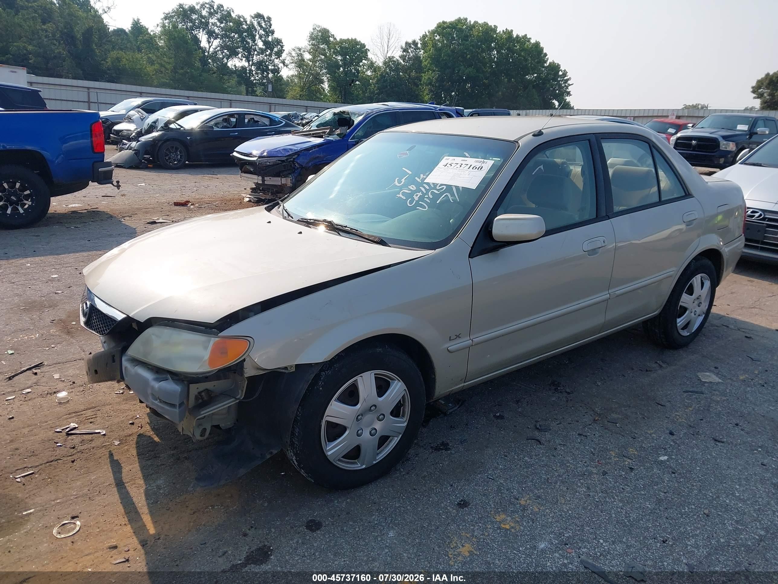 2002 Mazda Protege Dx/es/lx Желто-коричневый vin: JM1BJ225520515735