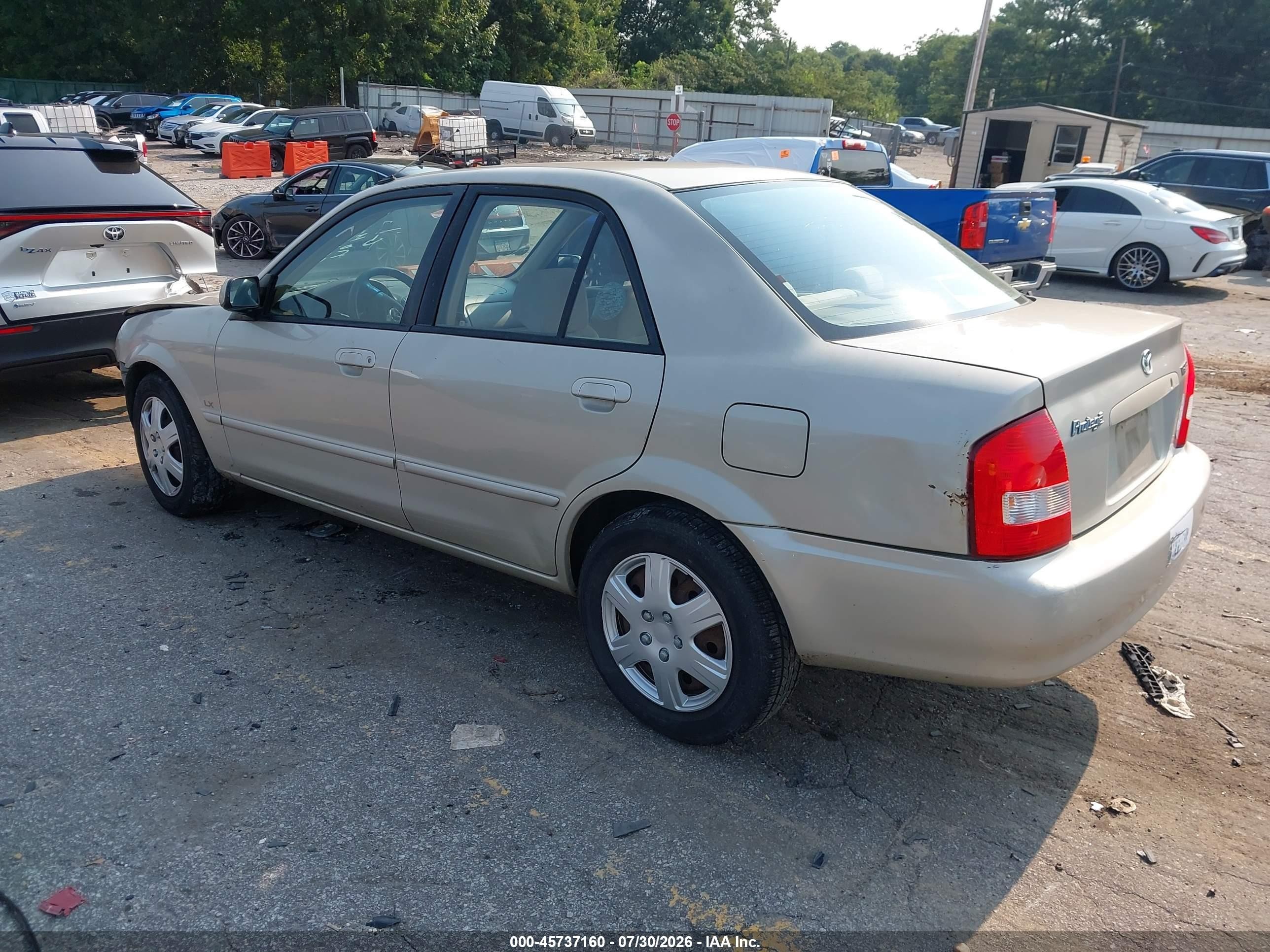 2002 Mazda Protege Dx/es/lx Желто-коричневый vin: JM1BJ225520515735