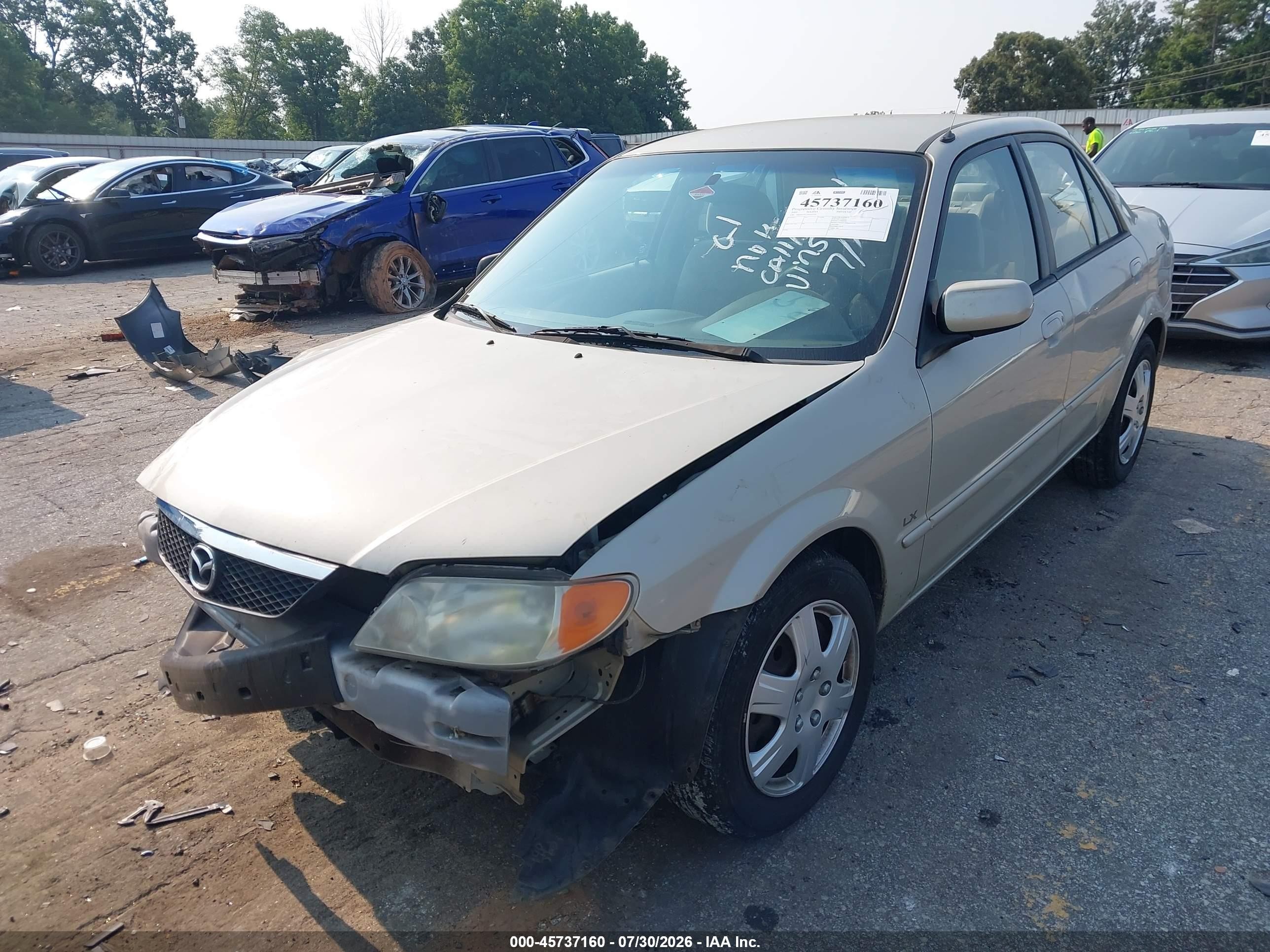 2002 Mazda Protege Dx/es/lx Желто-коричневый vin: JM1BJ225520515735
