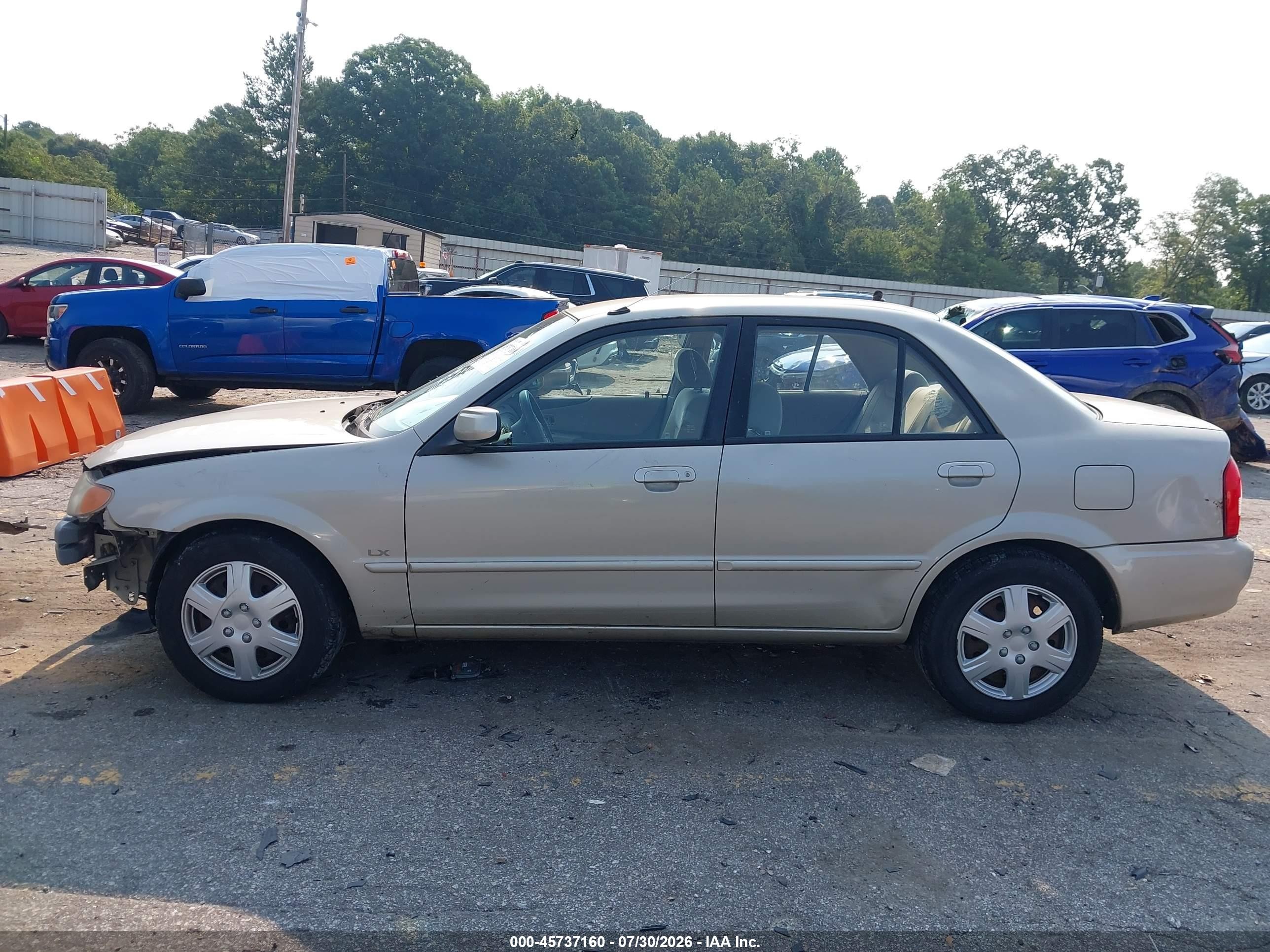 2002 Mazda Protege Dx/es/lx Желто-коричневый vin: JM1BJ225520515735