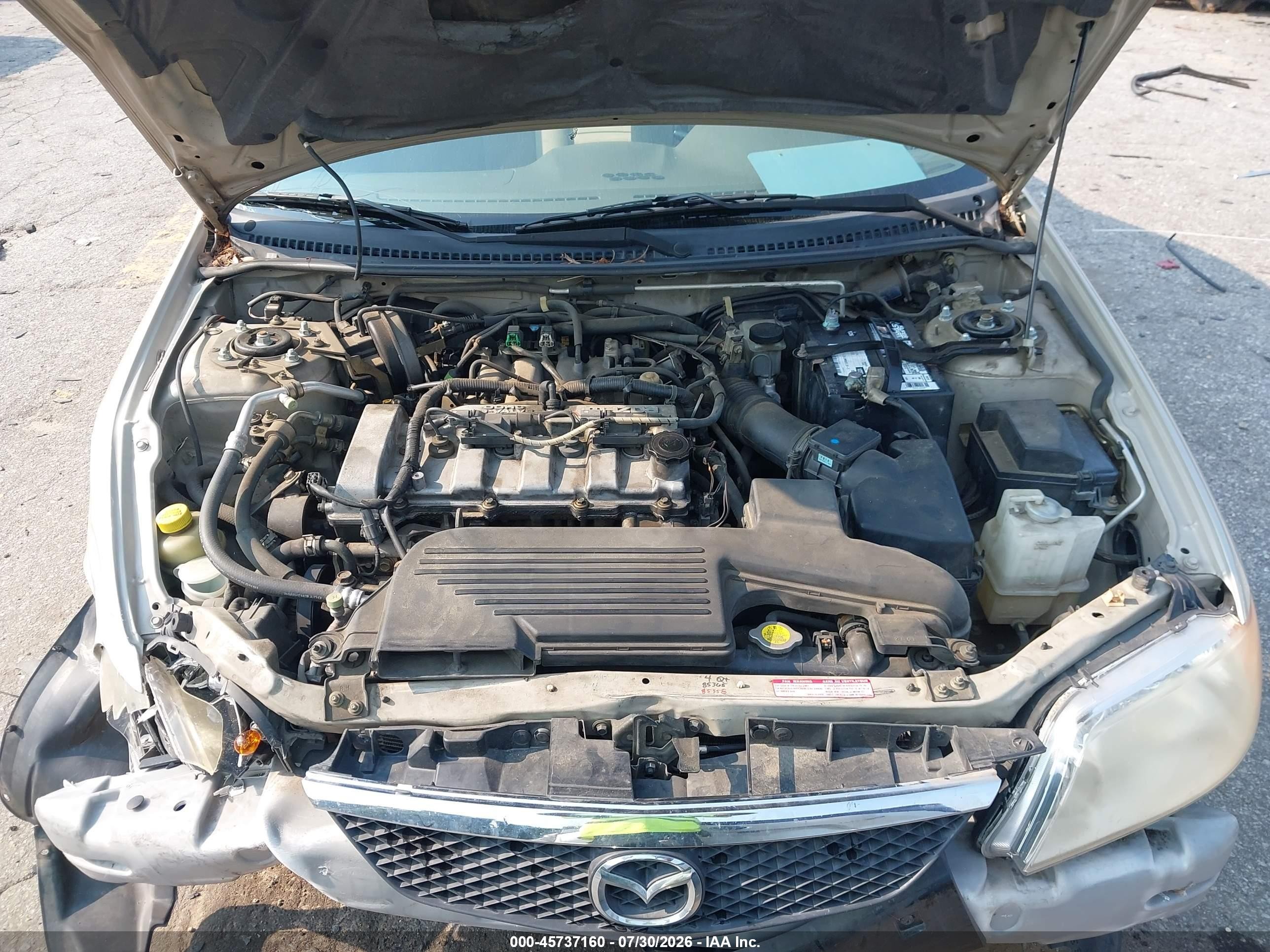 2002 Mazda Protege Dx/es/lx Желто-коричневый vin: JM1BJ225520515735