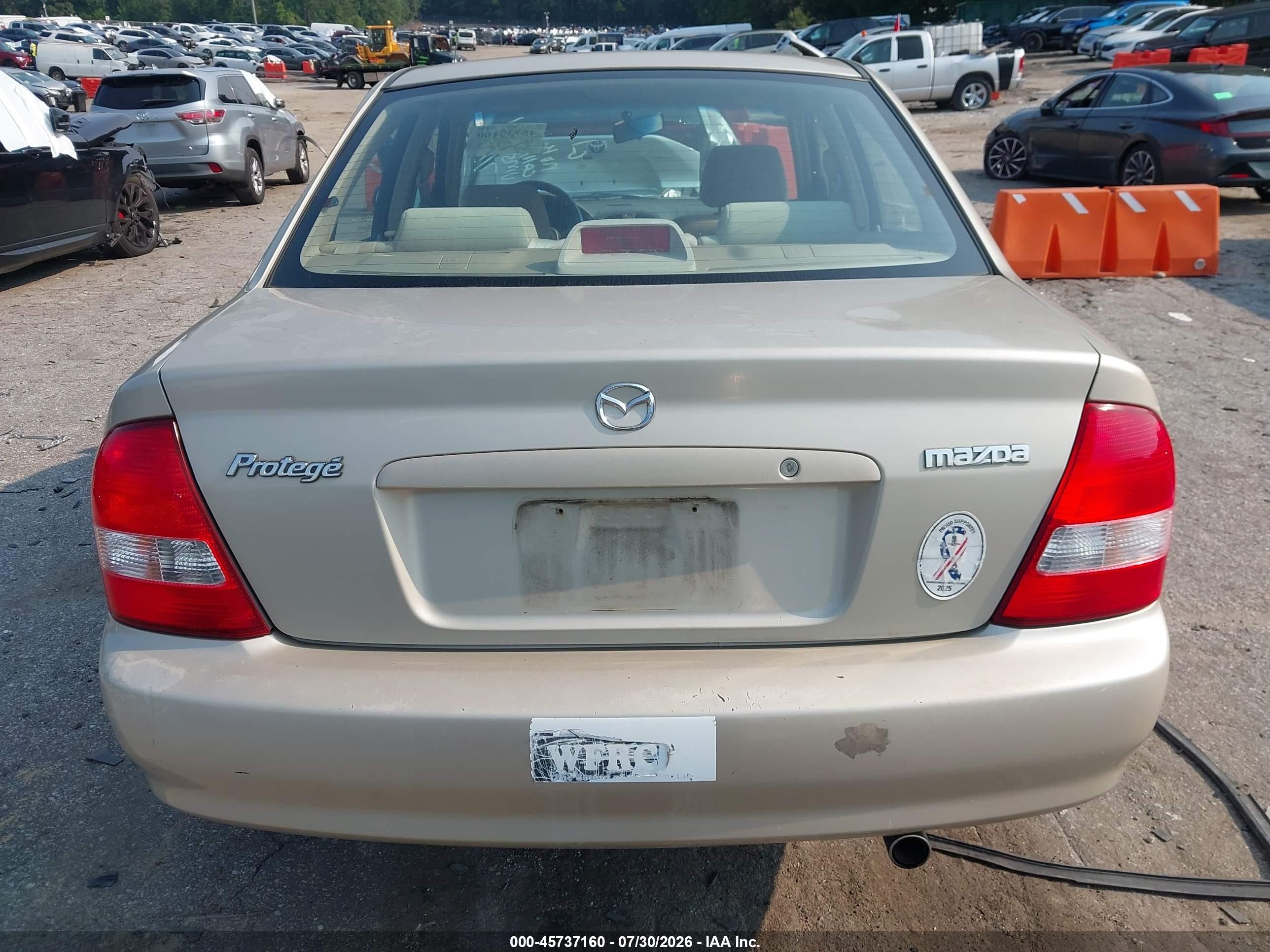 2002 Mazda Protege Dx/es/lx Желто-коричневый vin: JM1BJ225520515735