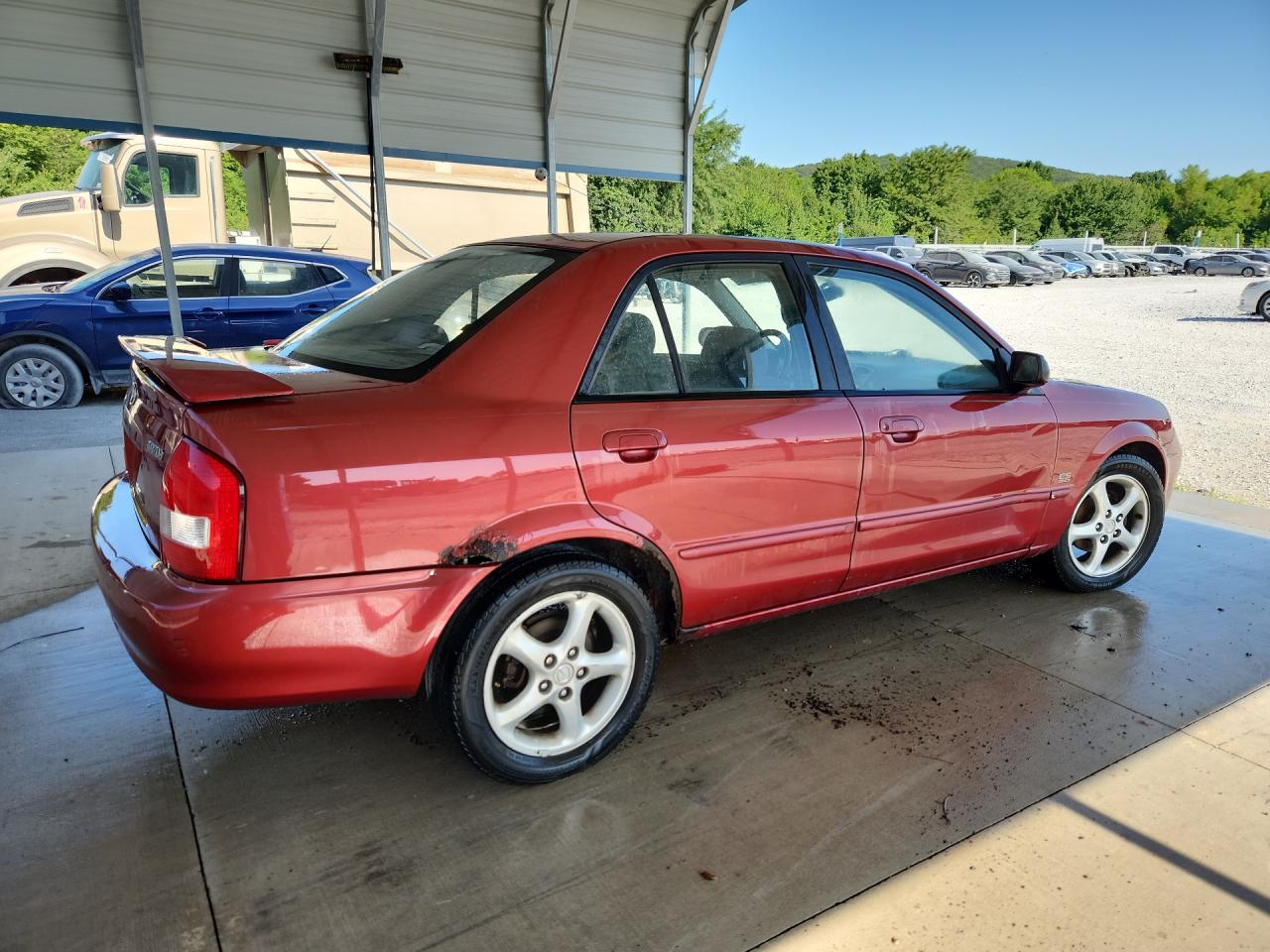 2001 Mazda Protege Lx Maroon vin: JM1BJ225710424030 Damage: Right Qtr Panel, Severe Damage, Replacement Required