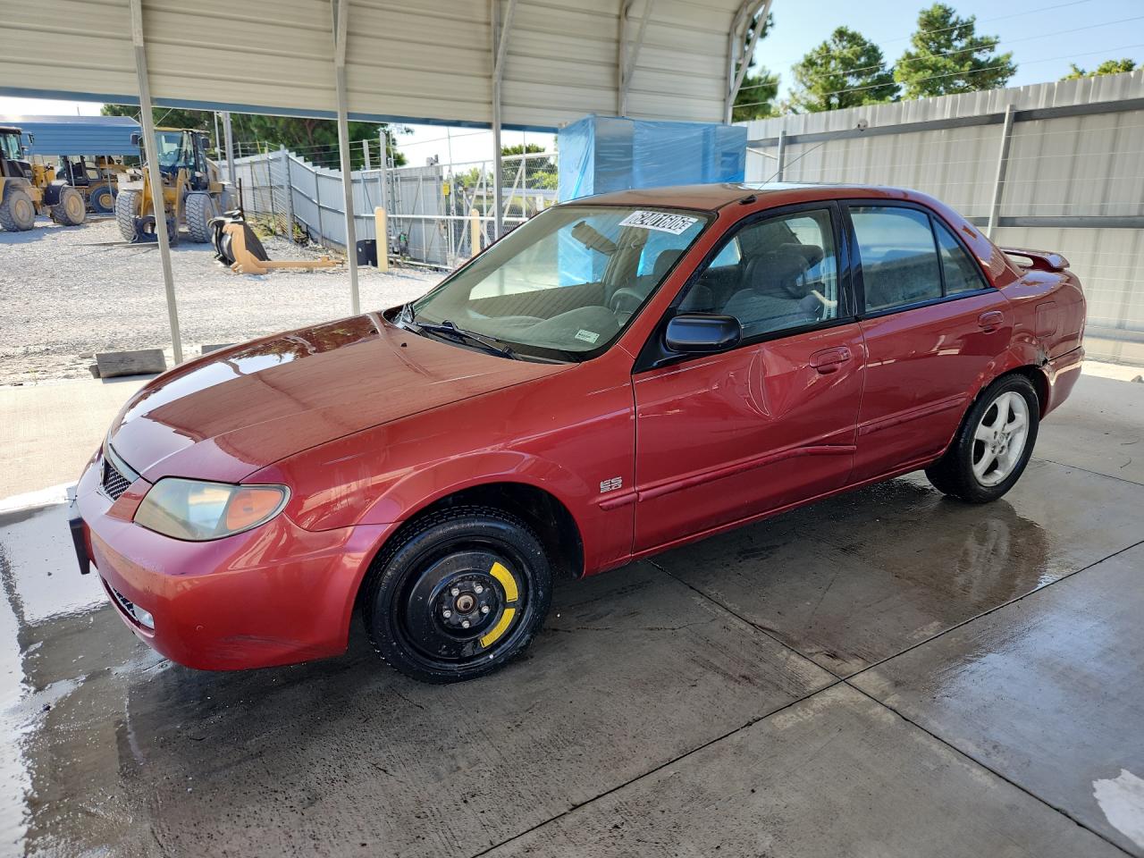 2001 Mazda Protege Lx Maroon vin: JM1BJ225710424030 Damage: Left Front Fender, Heavy Scratch, 1 To 2 Inches