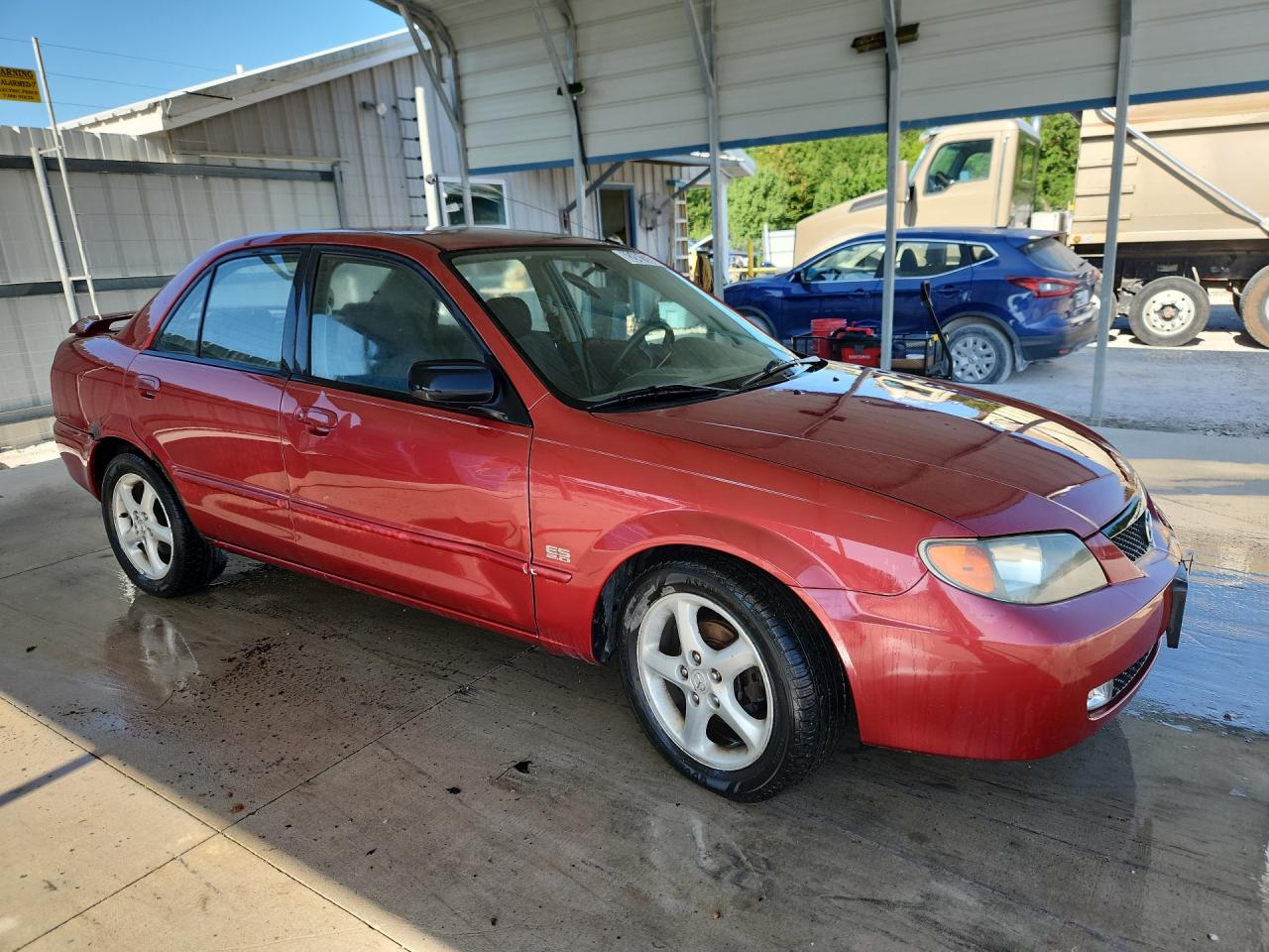 2001 Mazda Protege Lx Maroon vin: JM1BJ225710424030 Damage: Right Front Door, Dent(S) W/ Paint Dmg, > 12 Inches