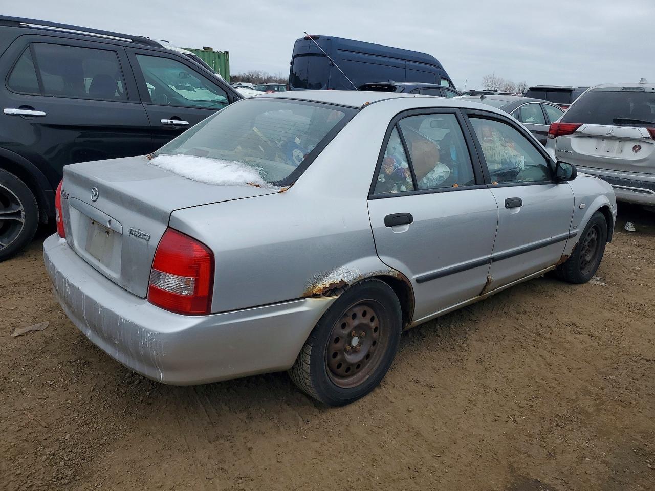 2003 Mazda Protege Silver vin: JM1BJ225730104693