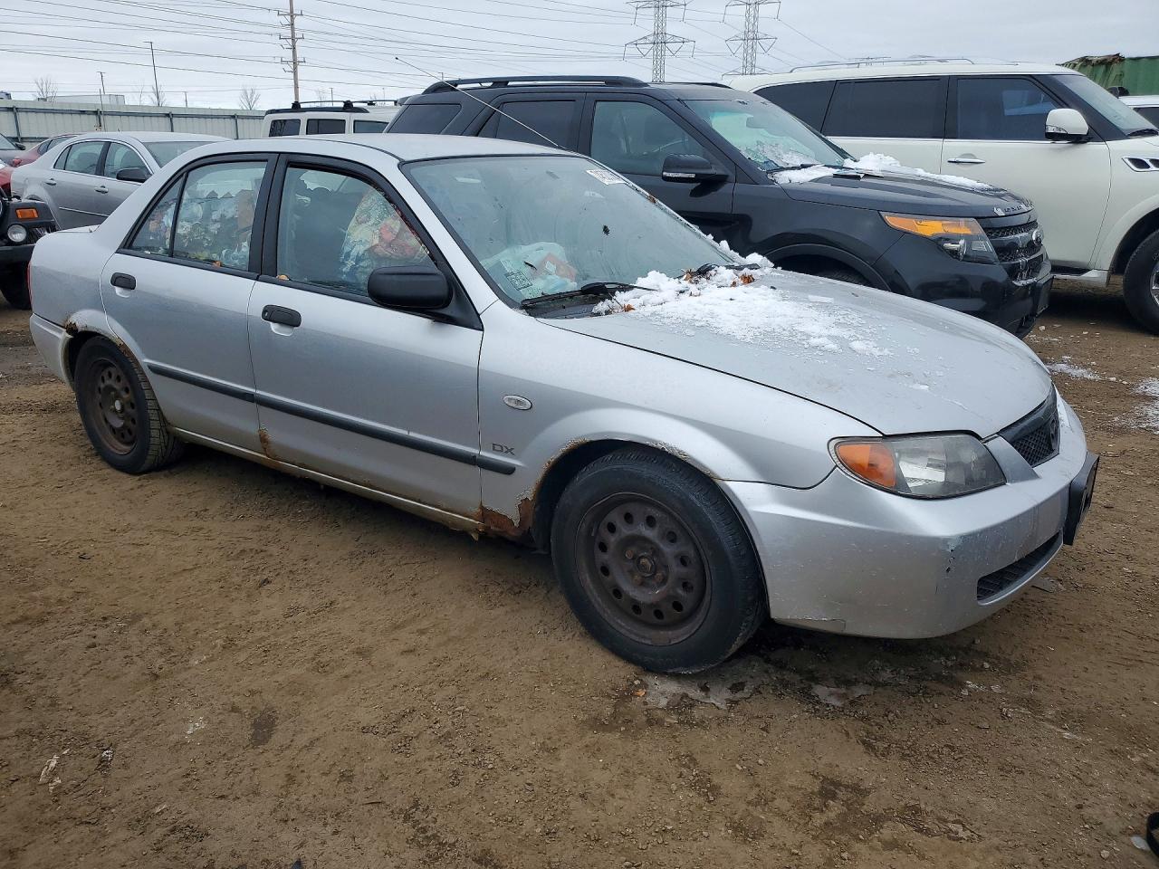 2003 Mazda Protege Silver vin: JM1BJ225730104693