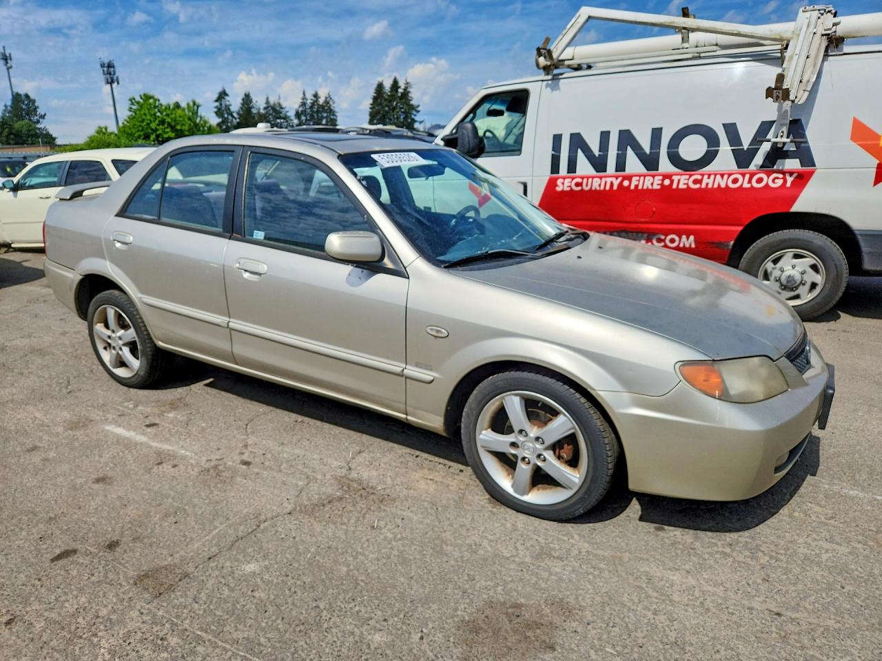 2003 Mazda Protege Dx Beige vin: JM1BJ226131206624