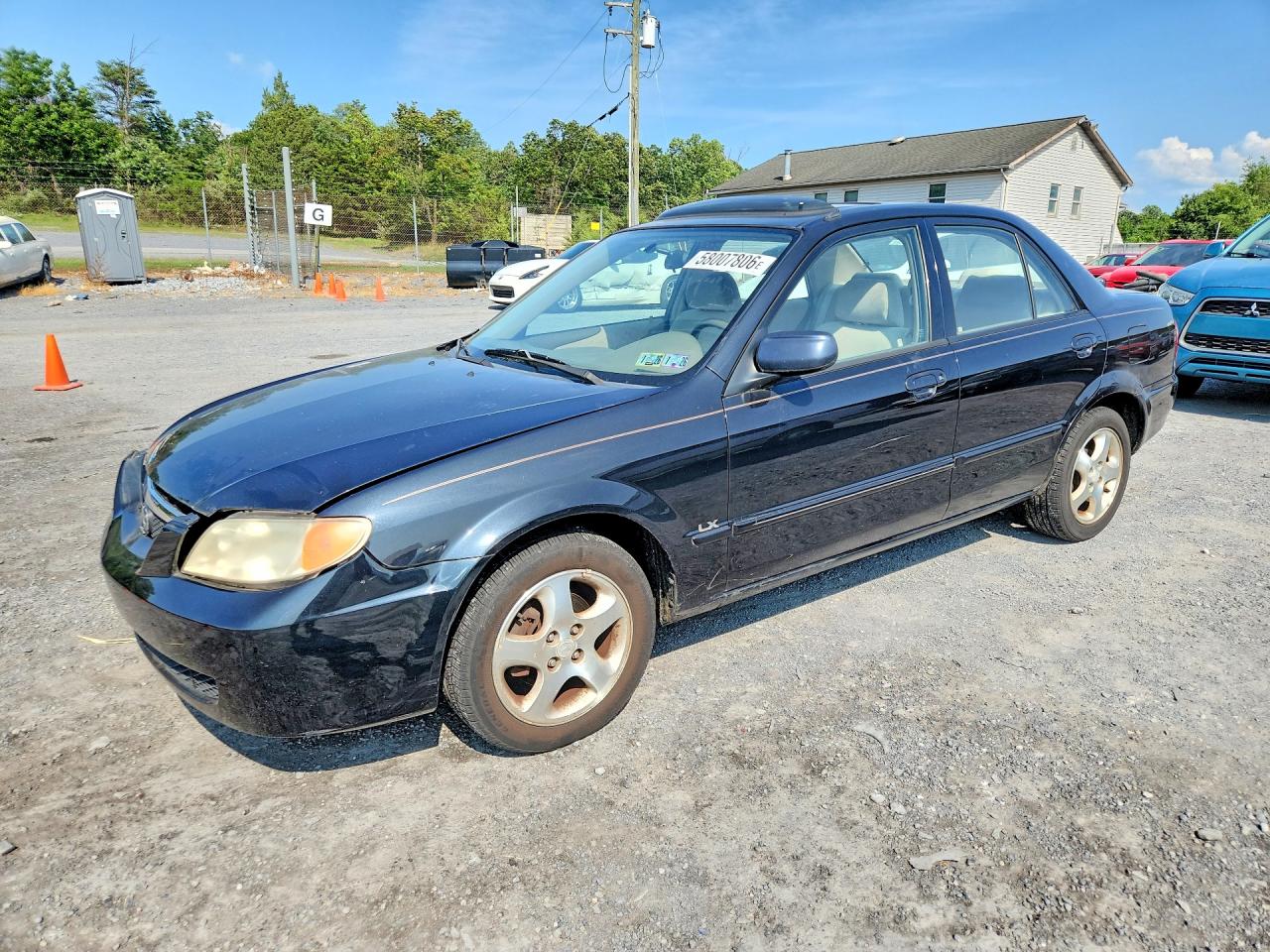 2002 Mazda Protege Dx Black vin: JM1BJ226X21555098