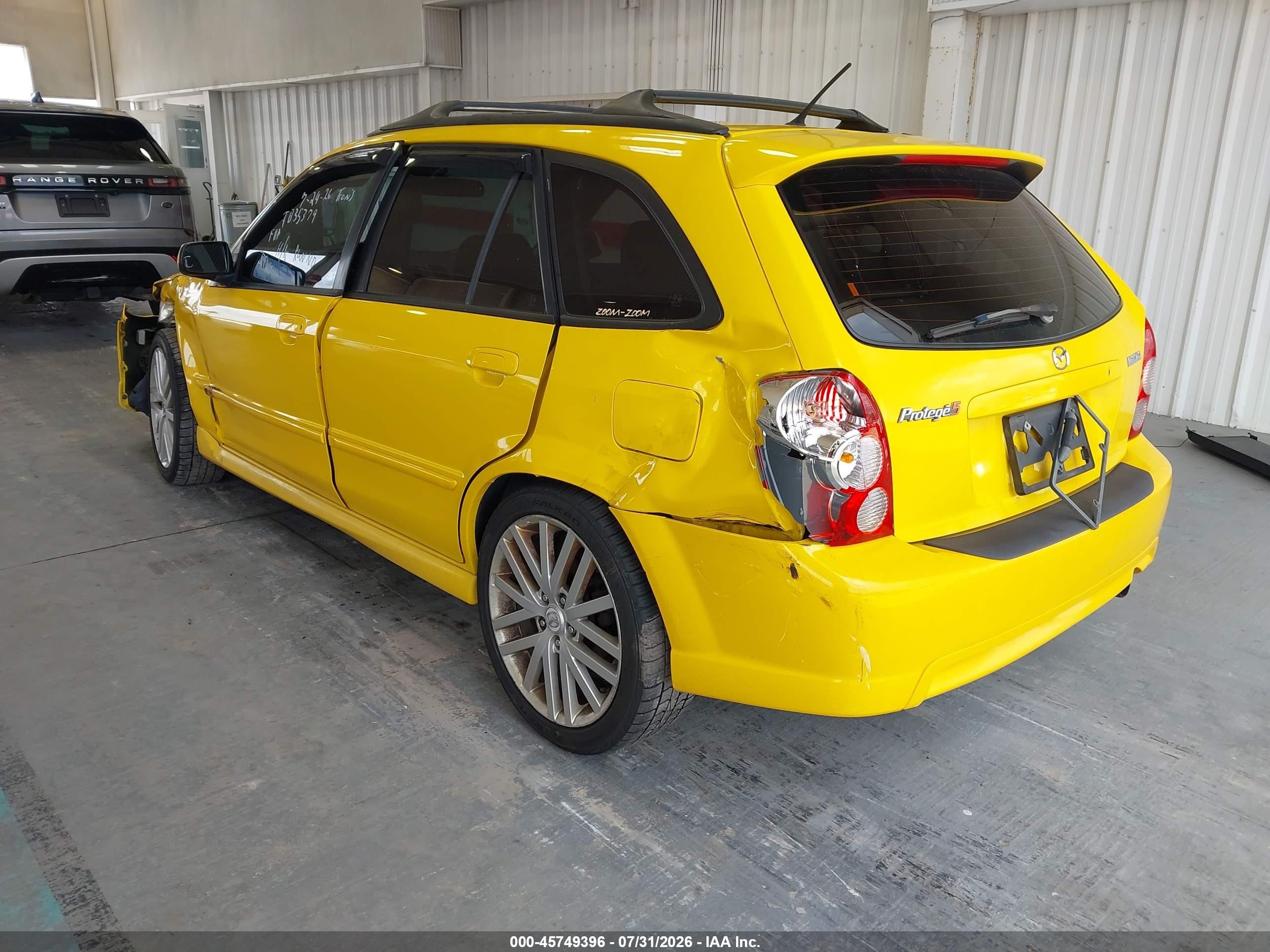 2002 Mazda Protege5   Yellow vin: JM1BJ245321547817