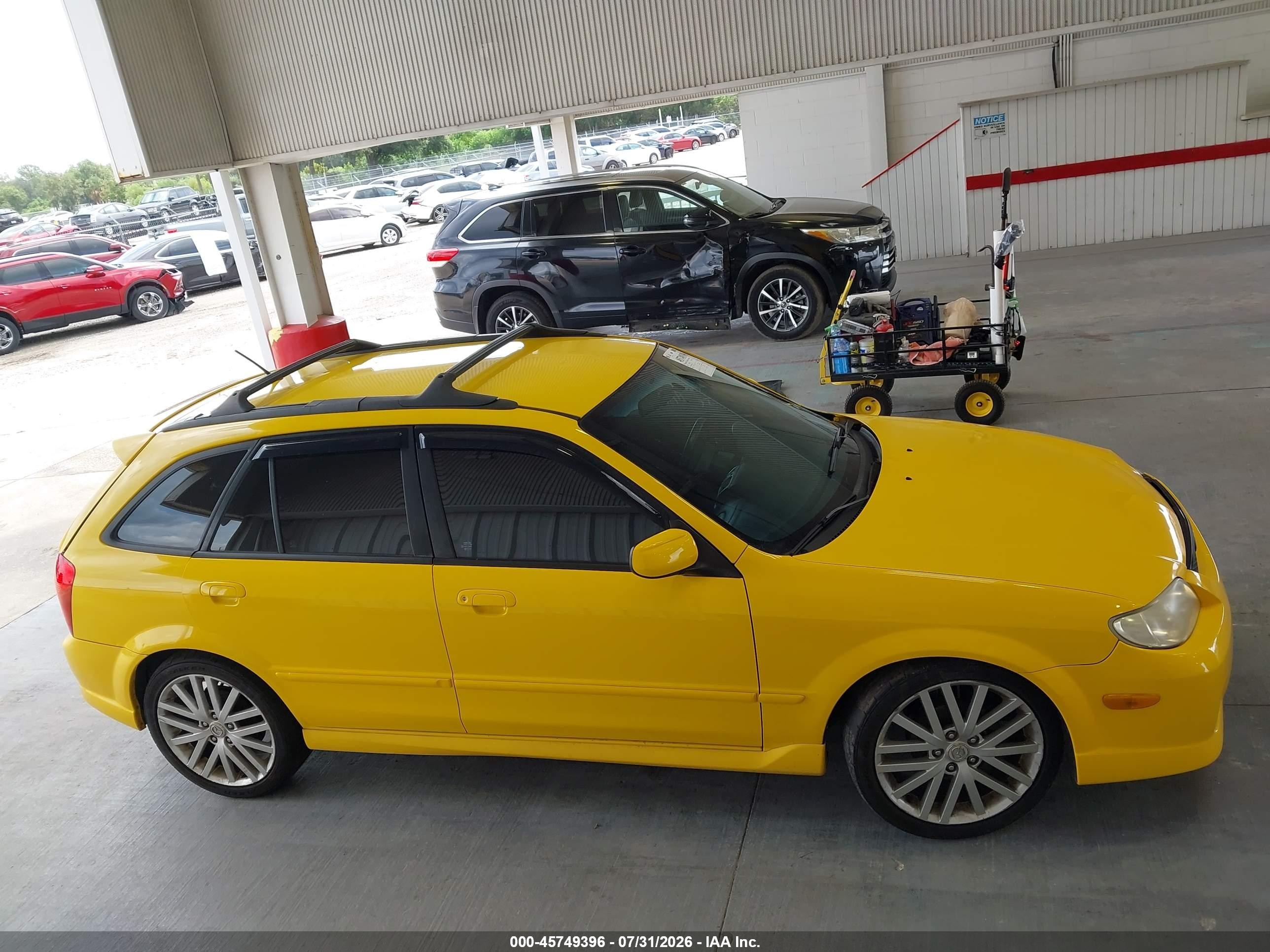 2002 Mazda Protege5   Yellow vin: JM1BJ245321547817