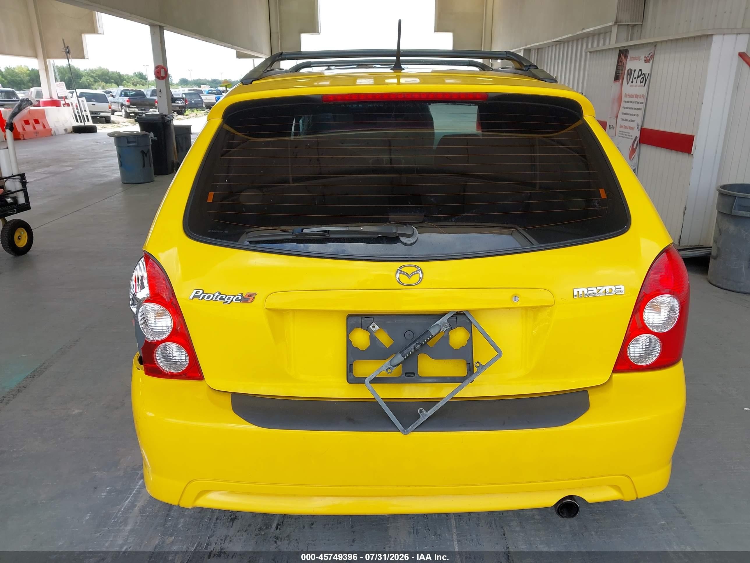 2002 Mazda Protege5   Yellow vin: JM1BJ245321547817