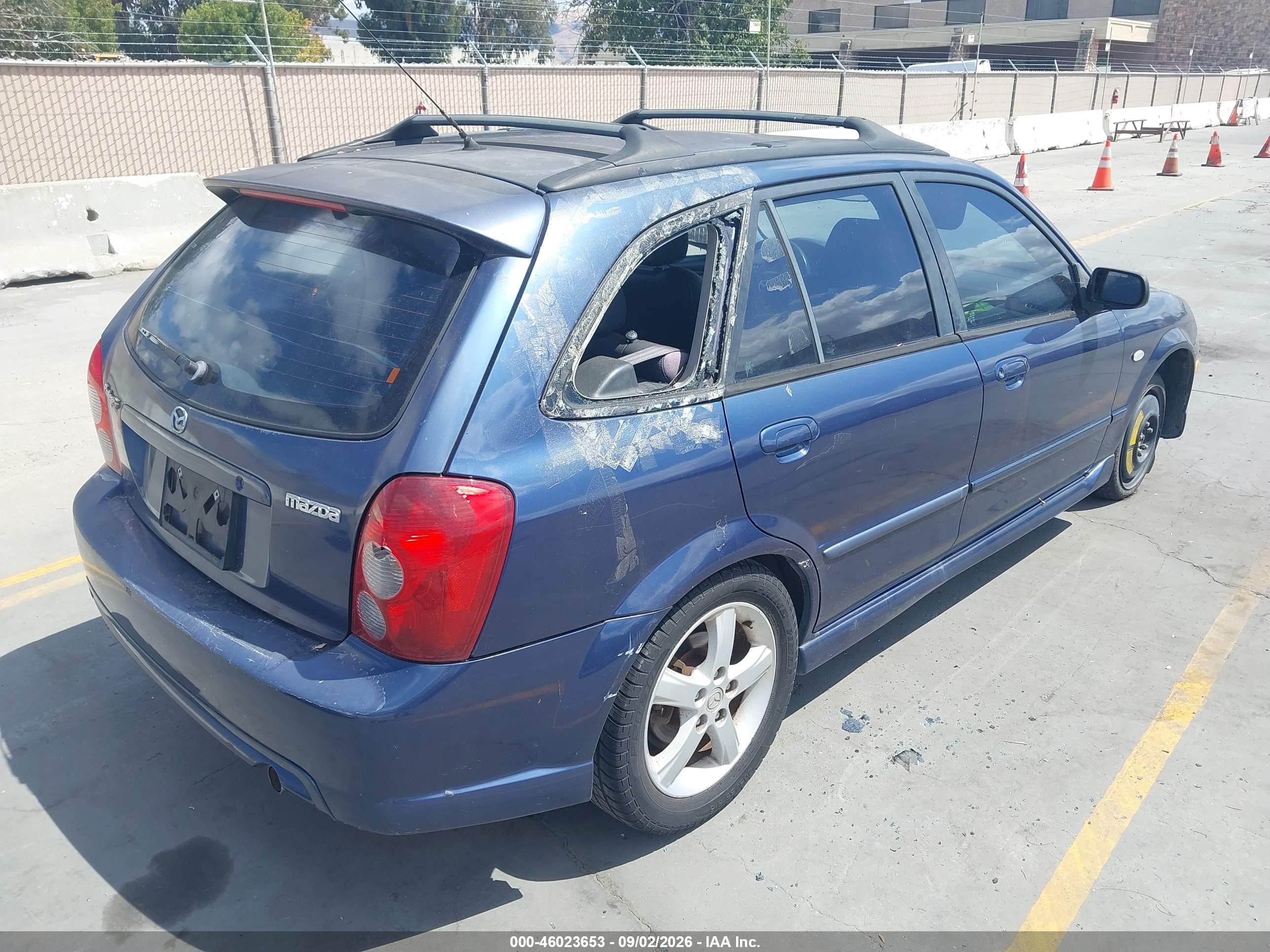 2002 Mazda Protege5   Blue vin: JM1BJ245321612956