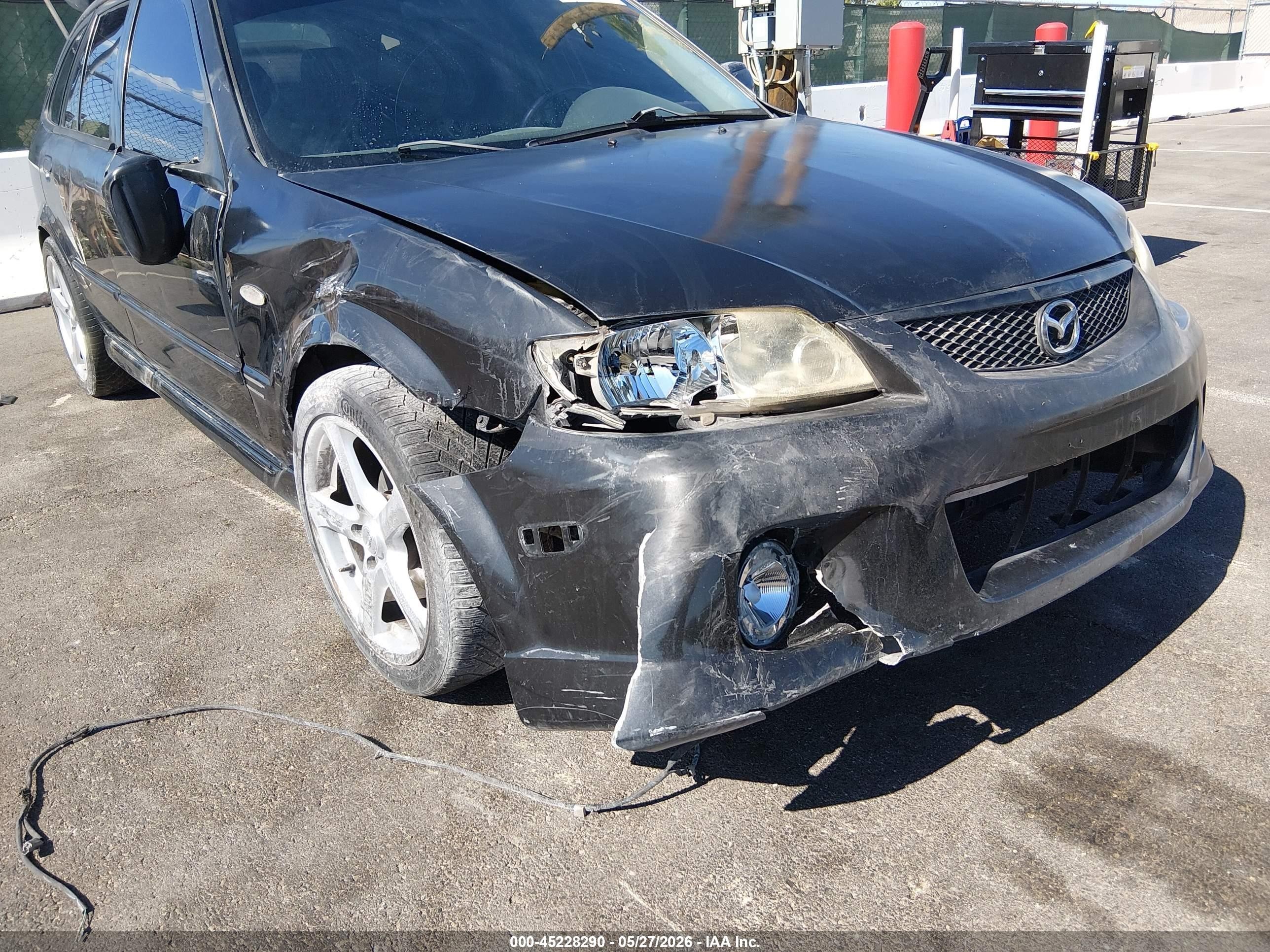 2002 Mazda Protege5   Black vin: JM1BJ245321637372