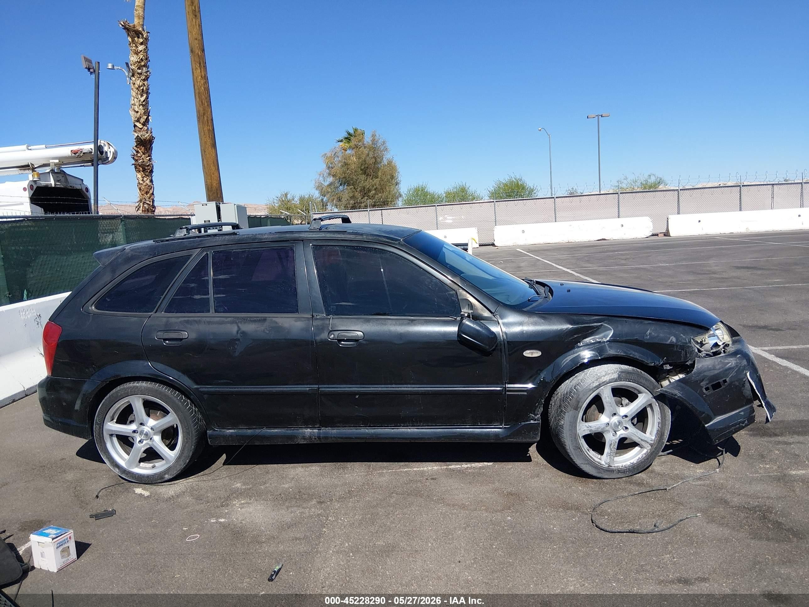 2002 Mazda Protege5   Black vin: JM1BJ245321637372