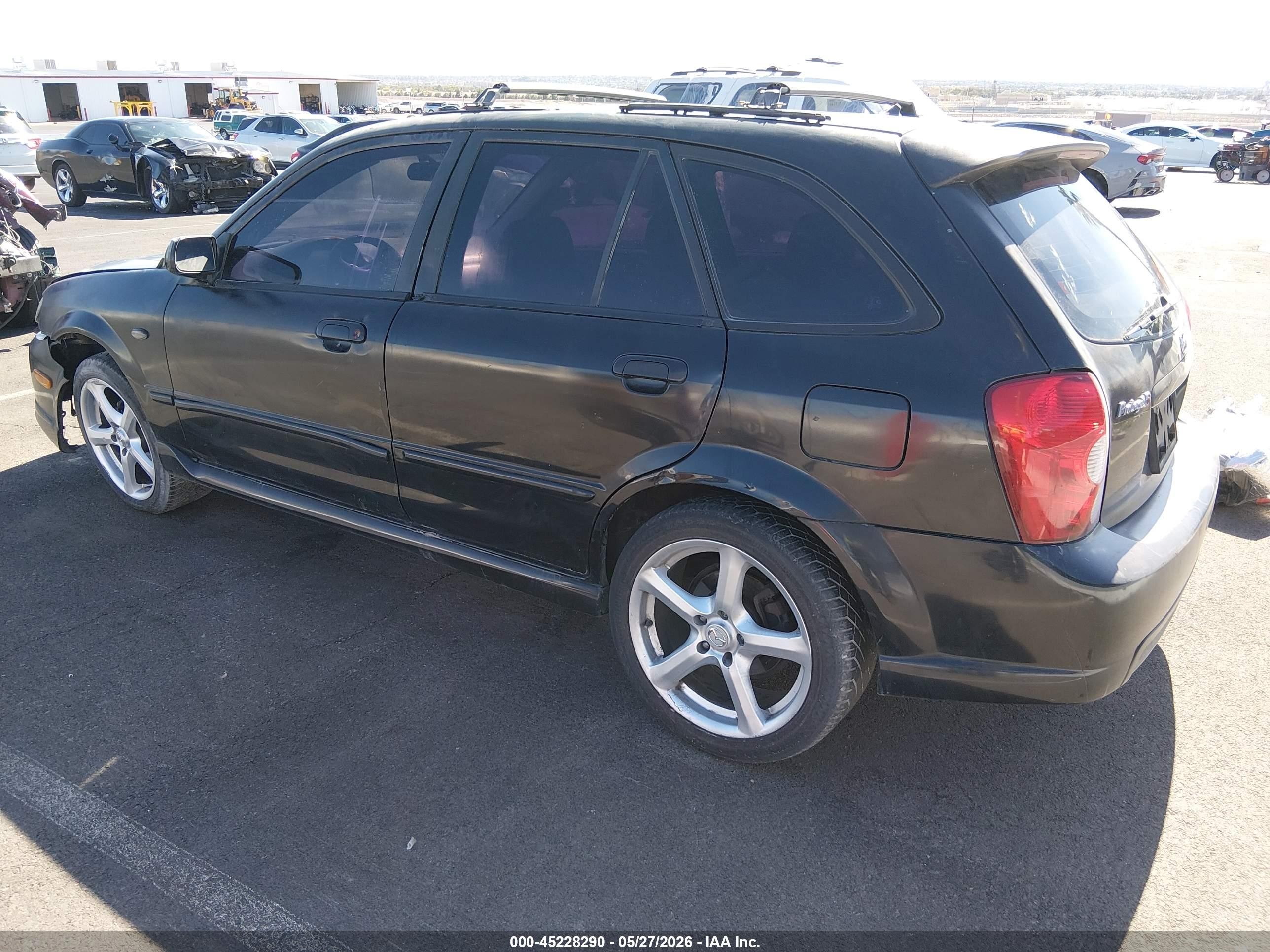 2002 Mazda Protege5   Black vin: JM1BJ245321637372