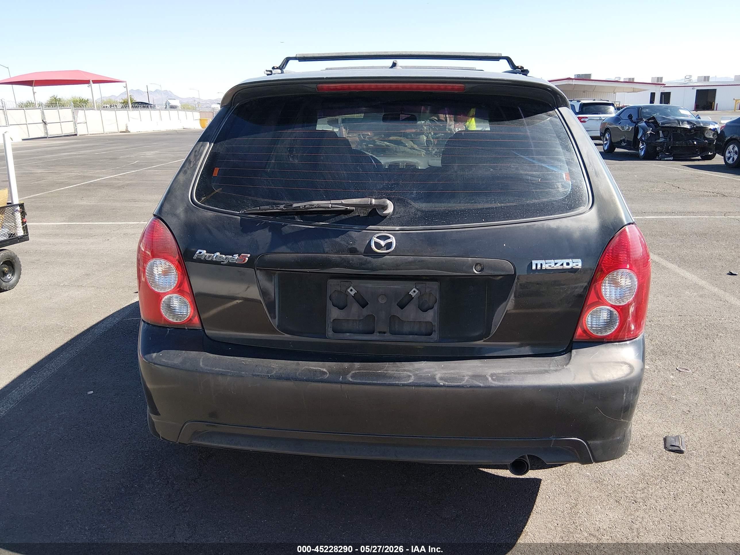 2002 Mazda Protege5   Black vin: JM1BJ245321637372