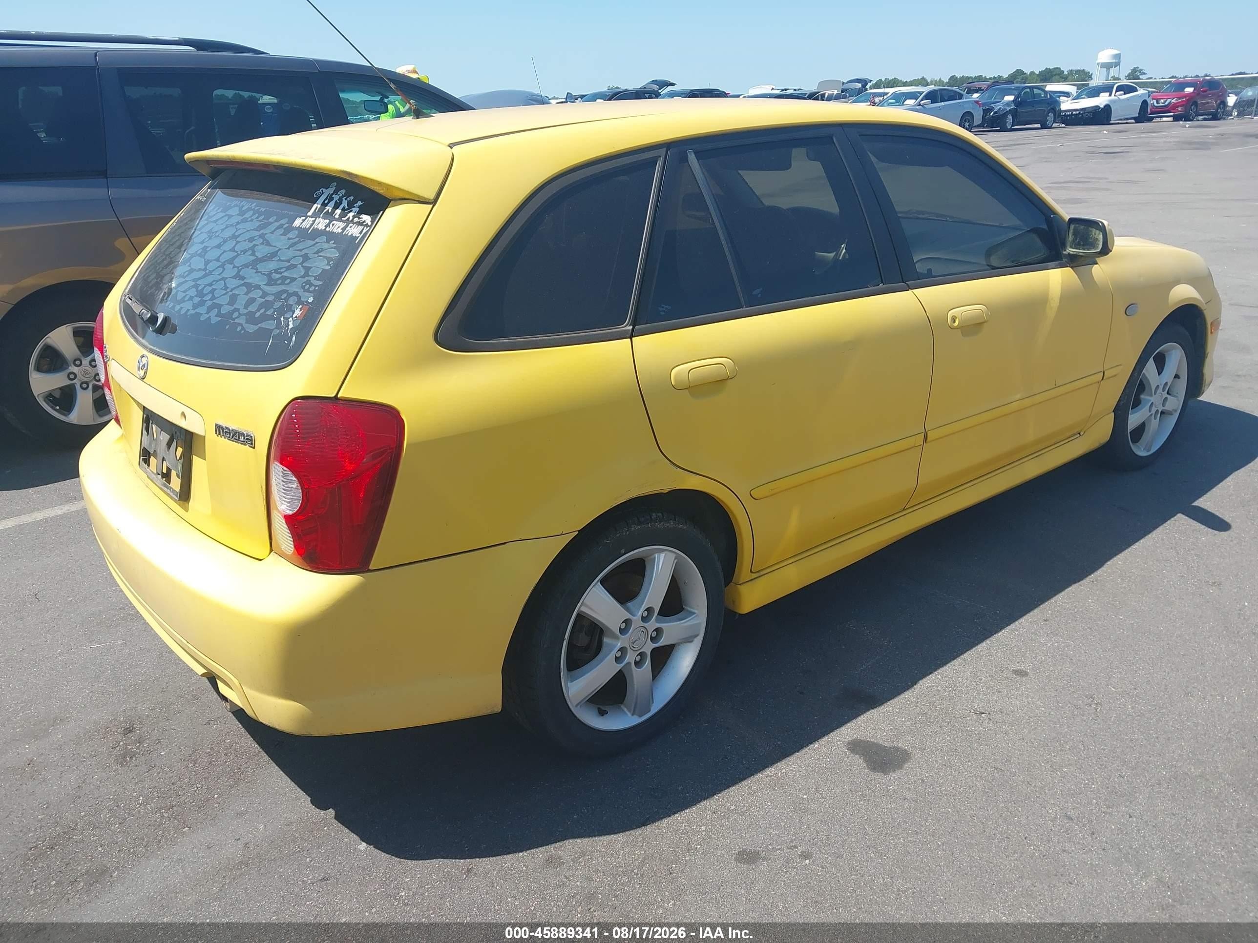 2003 Mazda Protege5   Yellow vin: JM1BJ245431184736