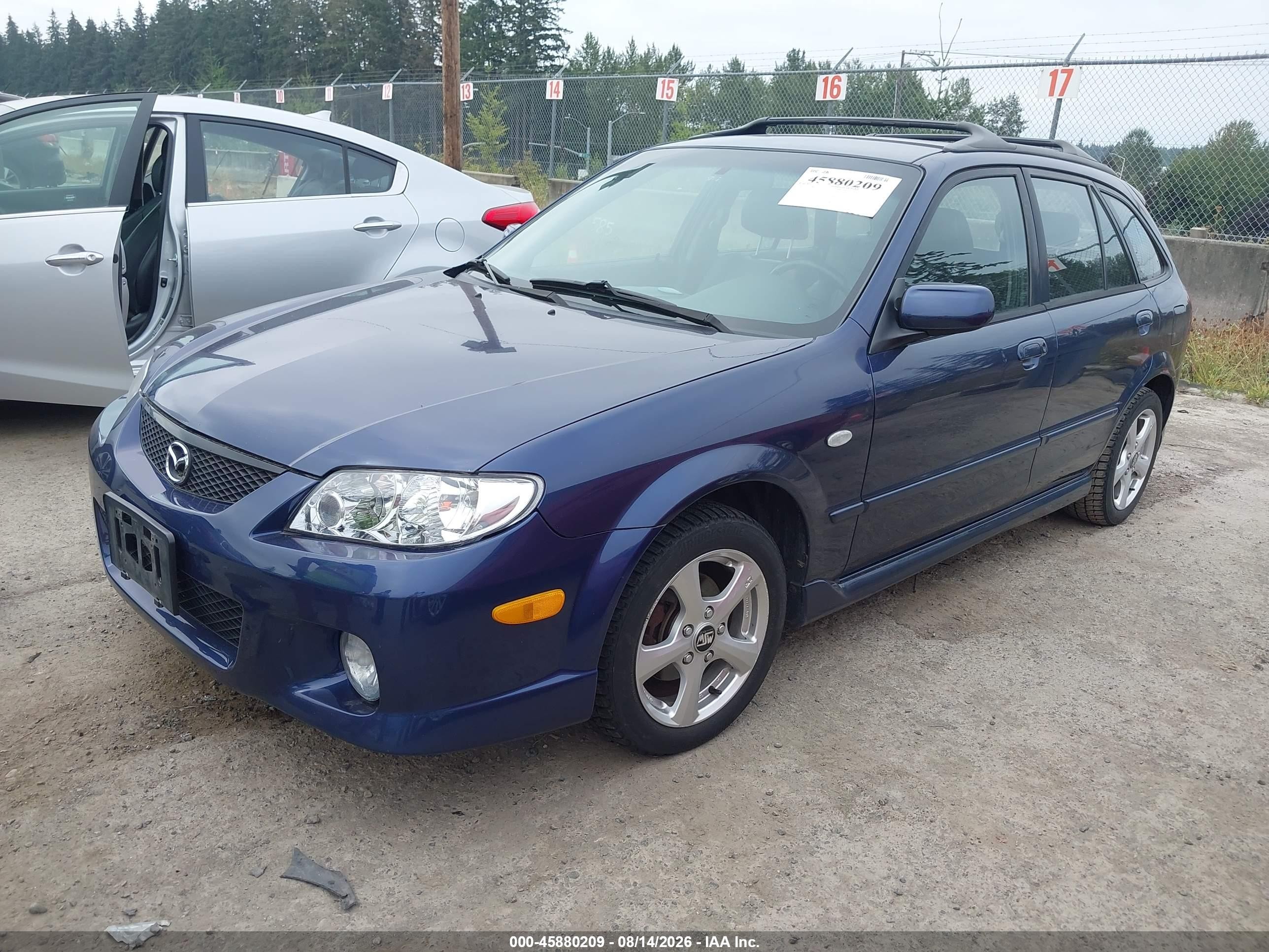 2002 Mazda Protege5   Blue vin: JM1BJ245721637665