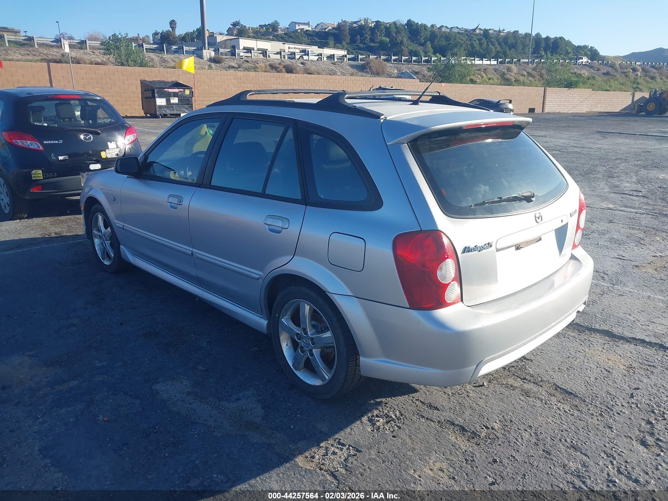 2003 Mazda Protege5   Silver vin: JM1BJ245831109120